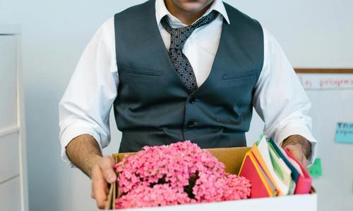 man with box in hands