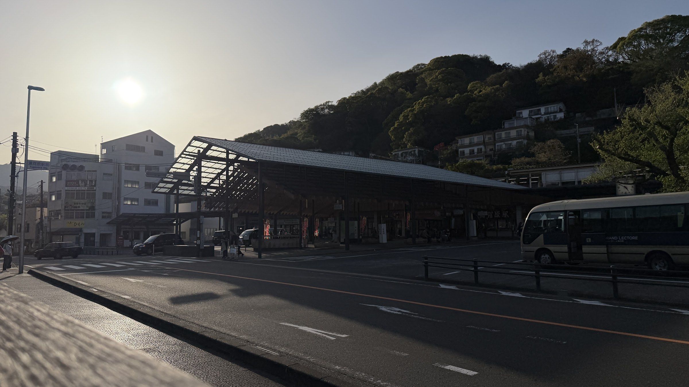Yugawara Station and its forecourt in afternoon light