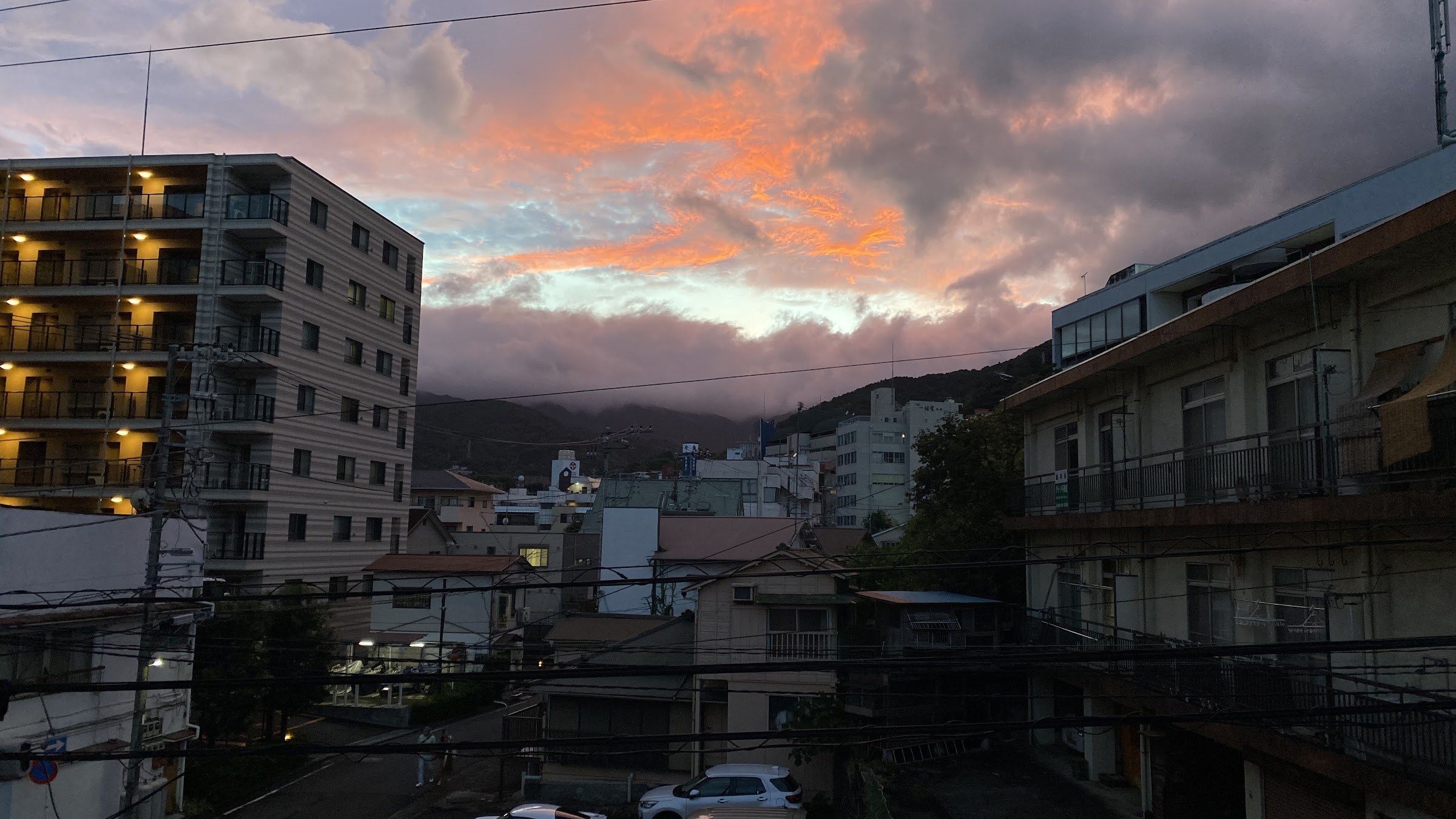Yugawara homes and buildings beneath an evening sky