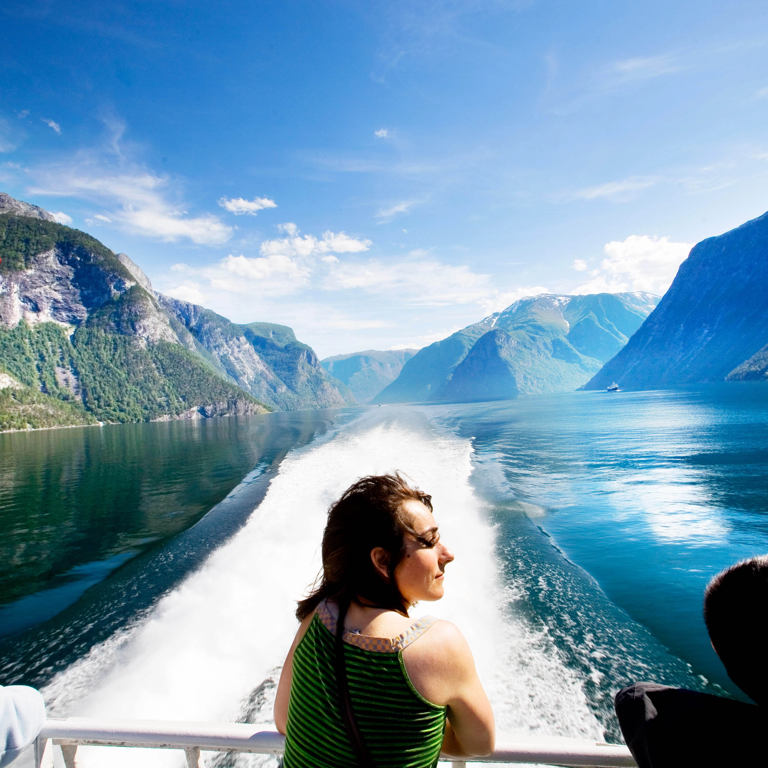 Sognefjord in a nutshell - fjord cruise Woman enjoying Norway and the Sognefjord in a nutshell - king of fjords in Norway |Fjord Tours
