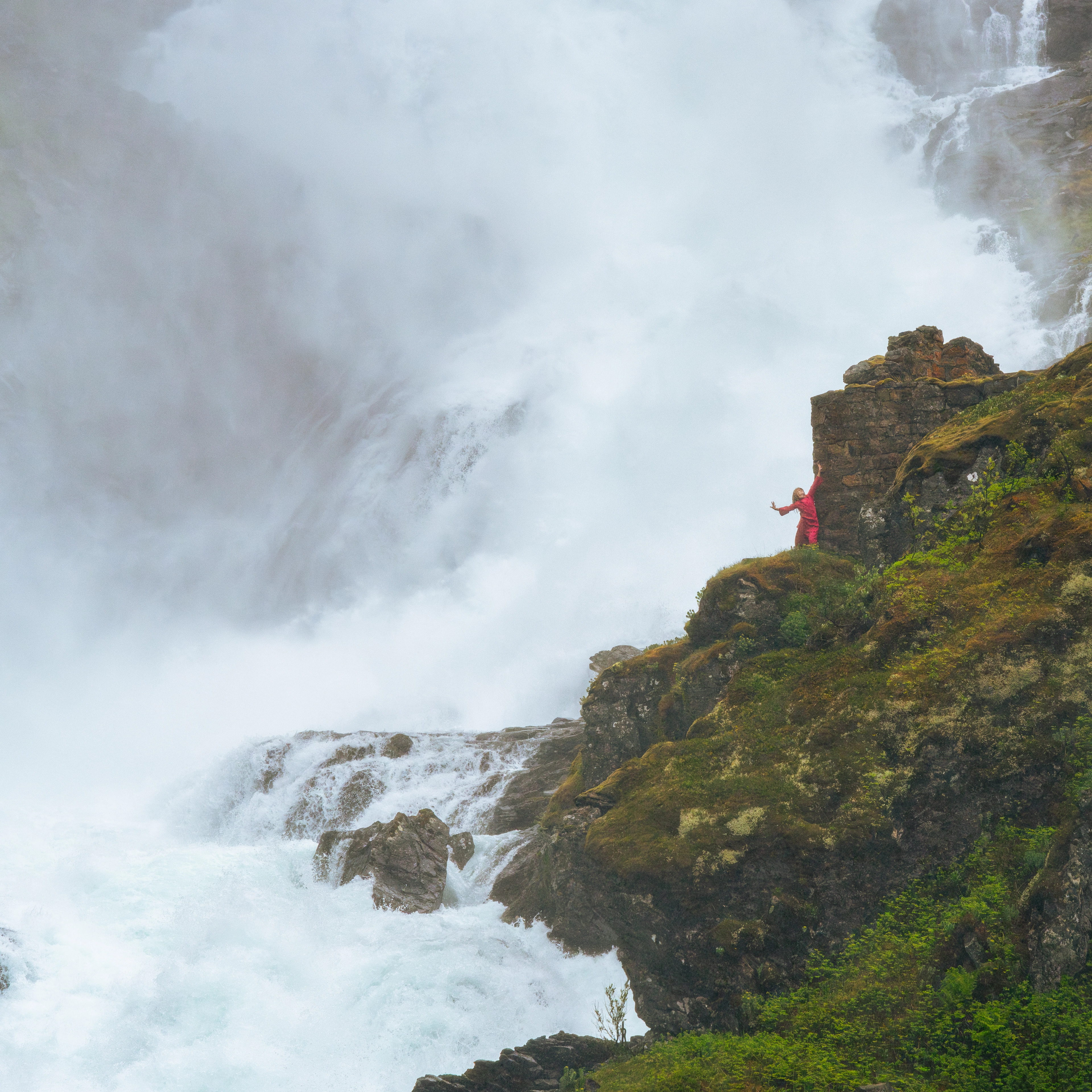 Huldra at the Kjosfossen waterfall Woman singing by the Kjosfossen waterfall