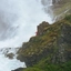 Woman singing by the Kjosfossen waterfall