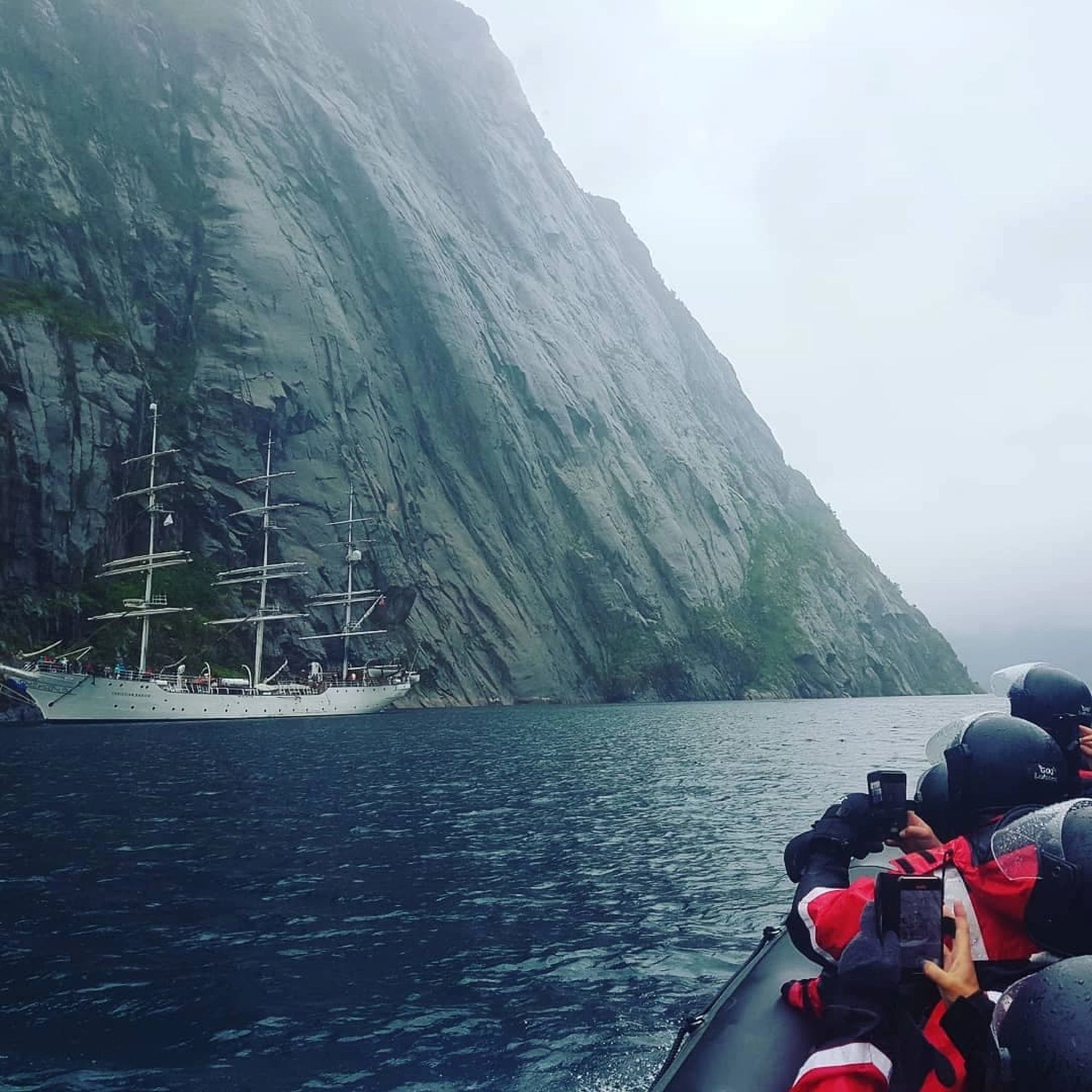 Eagle safari in Lofoten - passing sailboats - trip from Svolvær, Norway