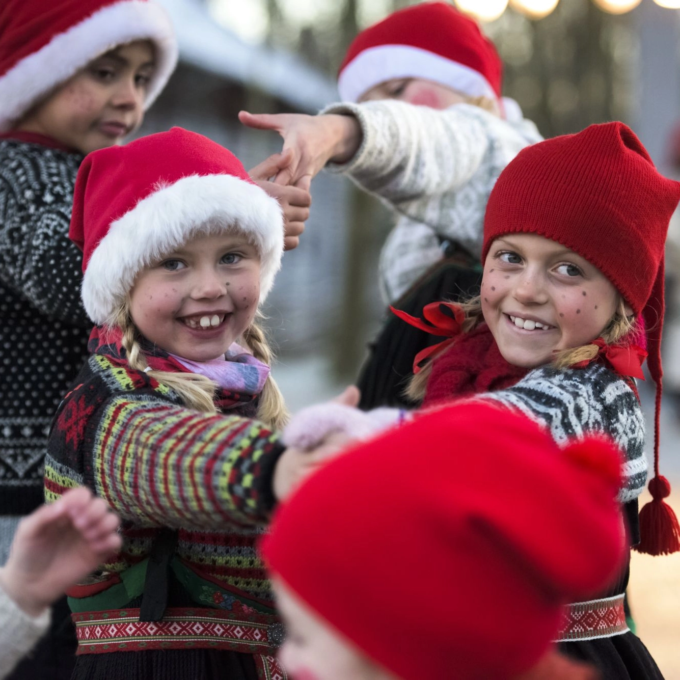 Little Santas dancing in the market - Oslo- Norway