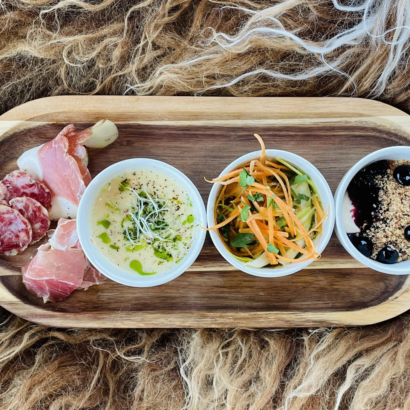 Plank with local food on top of Ulriken - Activities in Bergen, Norway