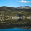RIB-Bootsfahrt auf dem Hardangerfjord von Ulvik - Blick nach Ulvik, Norwegen
