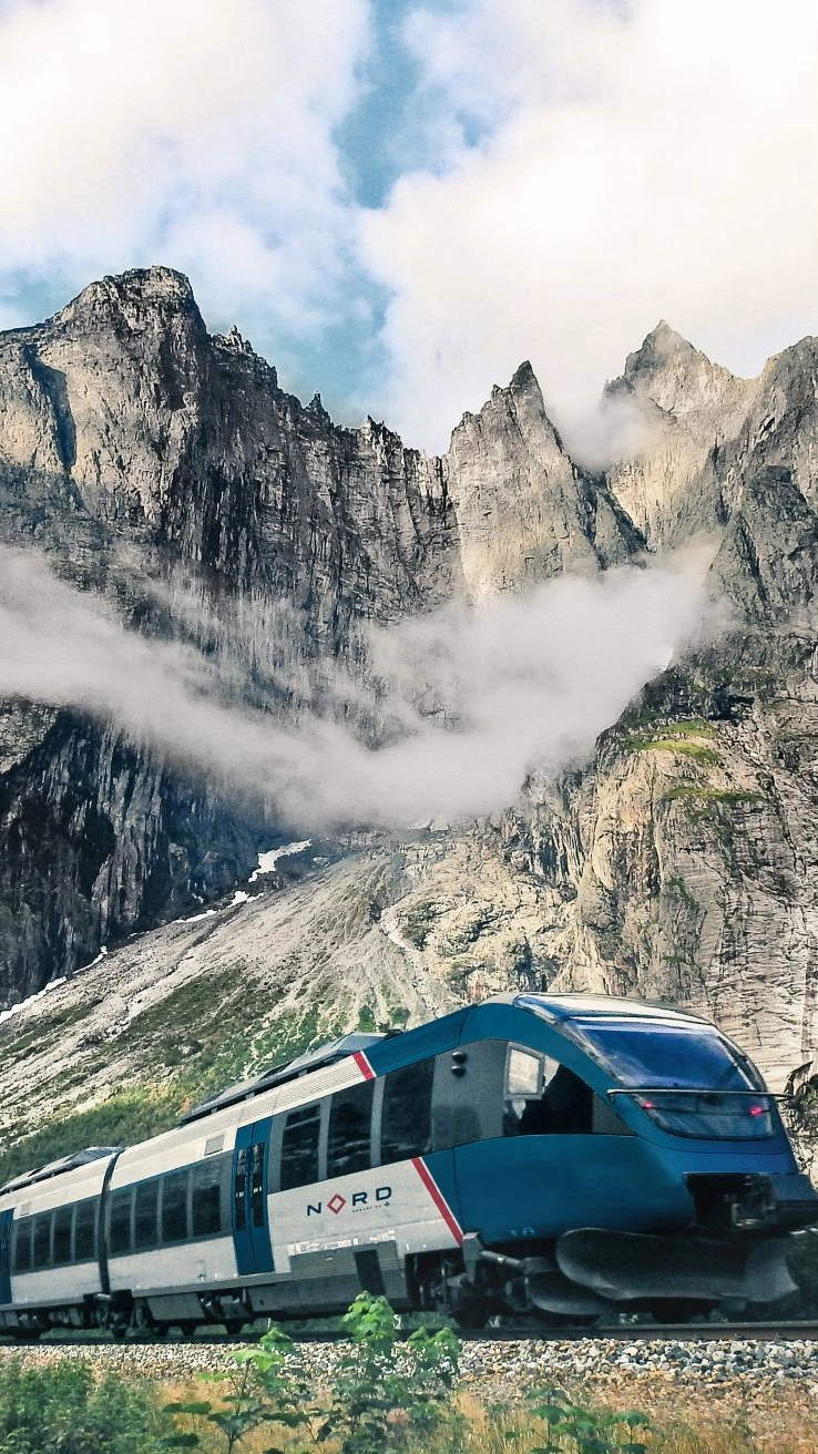 The Rauma Railway passing by the Trollveggen mountain - Åndalsnes, Norway