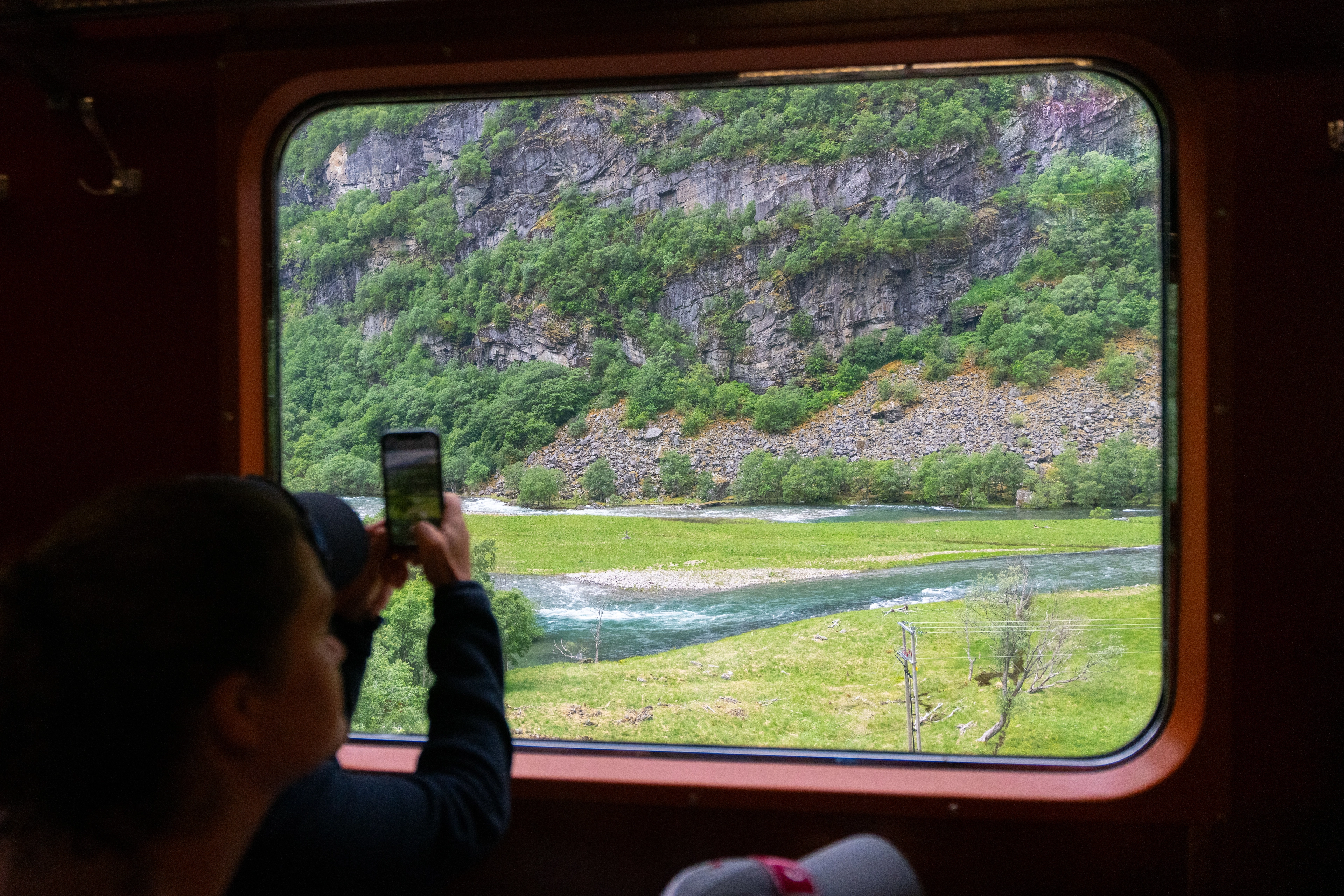 Man taking photos on the Flåm Railway