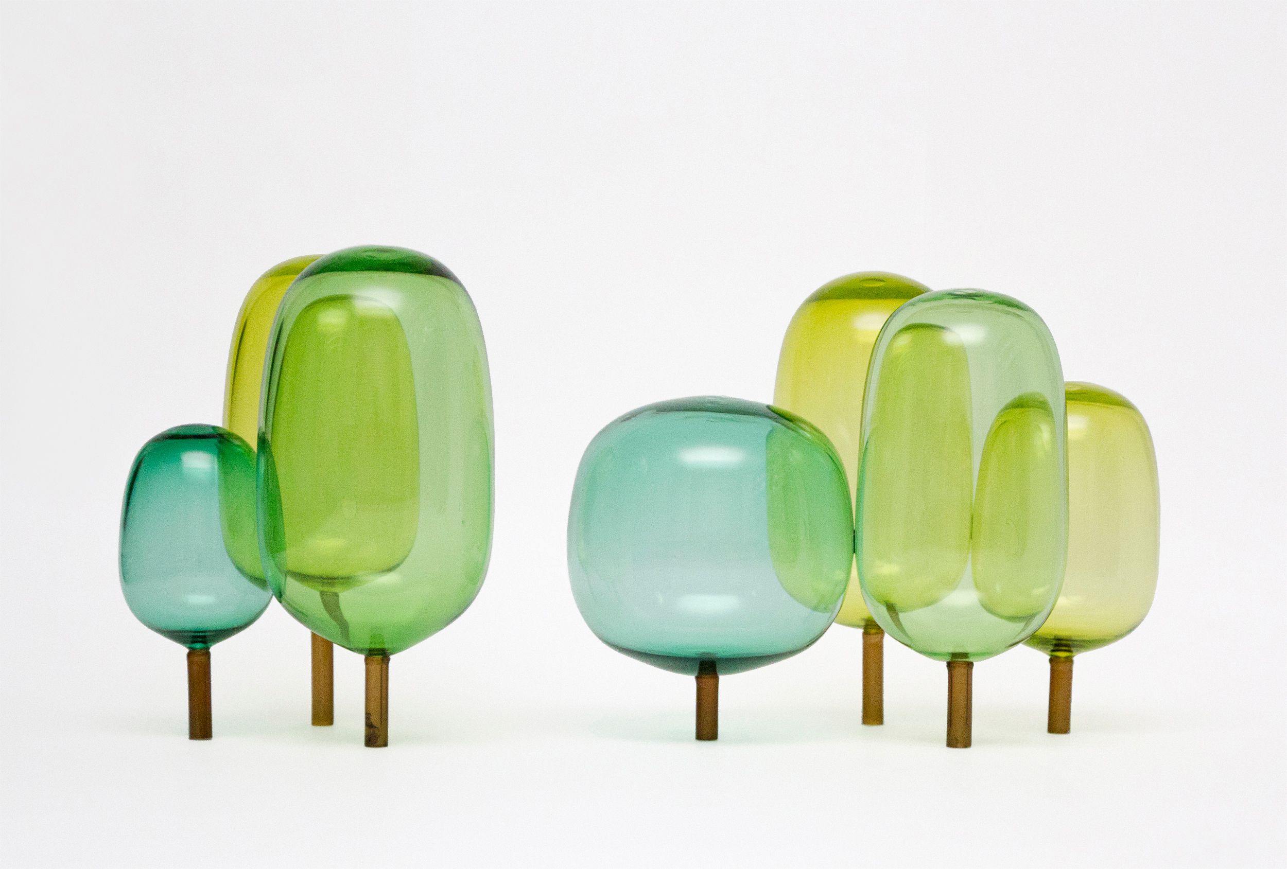 The woods designed by Jonas Stokke, Øystein Austad and Andreas Engesvik, green and blue glass sculptures, mouth blown glass