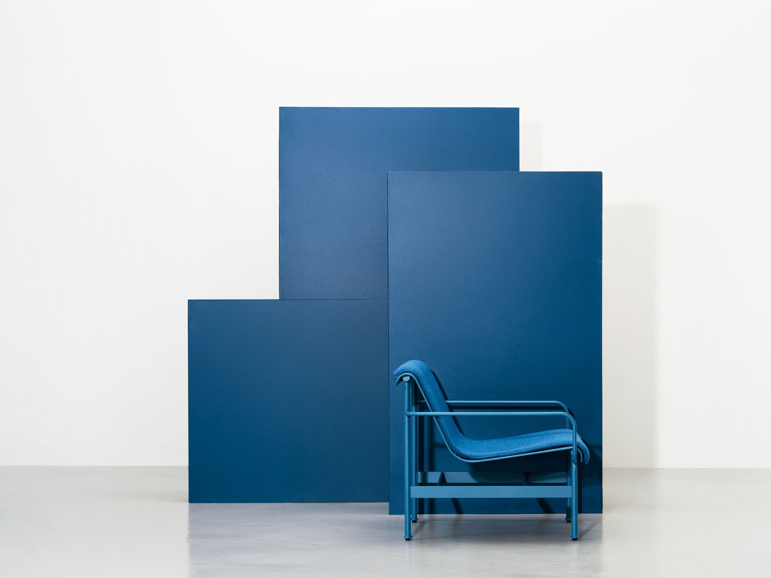 Munch Chair designed by Jonas Stokke and Andreas Engesvik for the Munch Museum in Oslo, blue chair with pillow, side view