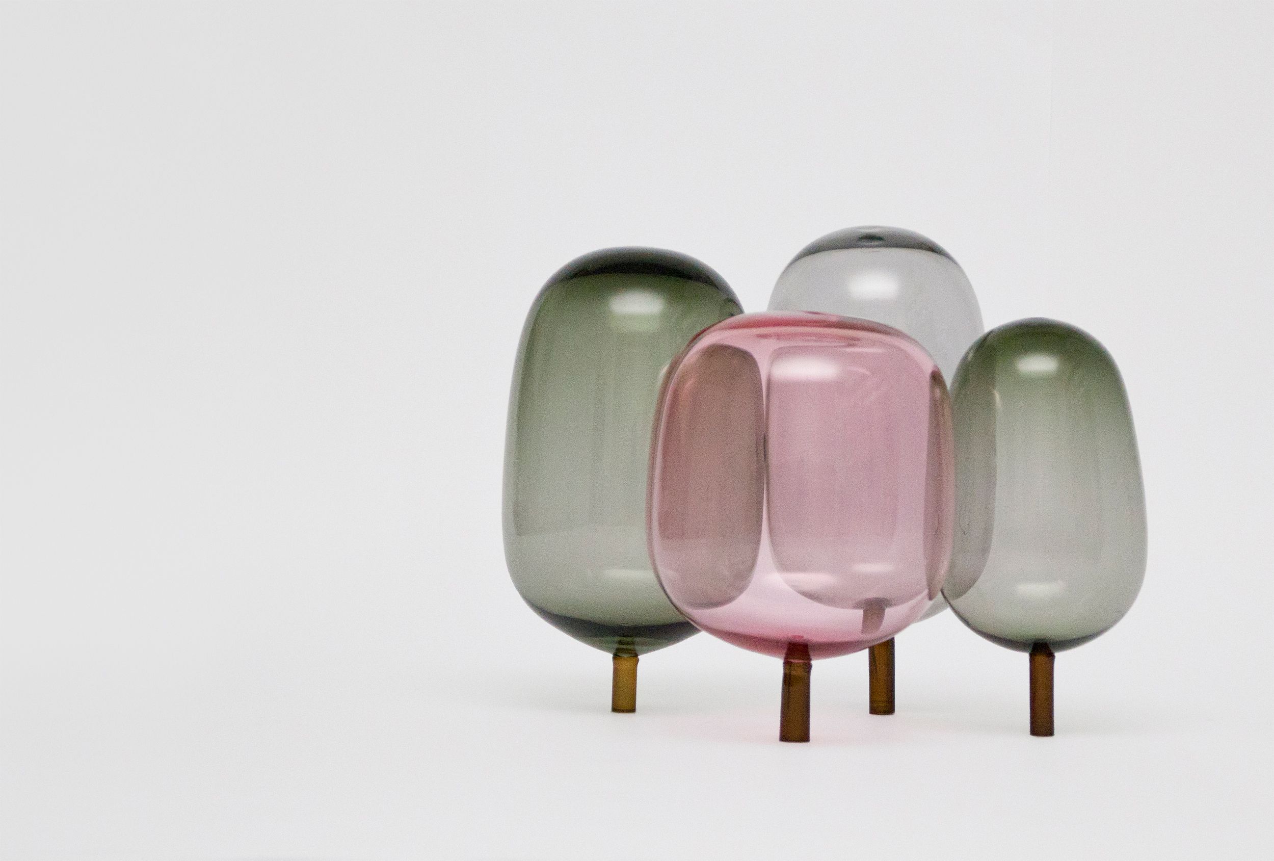 The woods designed by Jonas Stokke, Øystein Austad and Andreas Engesvik, pink and and grey glass sculptures, mouth blown glass