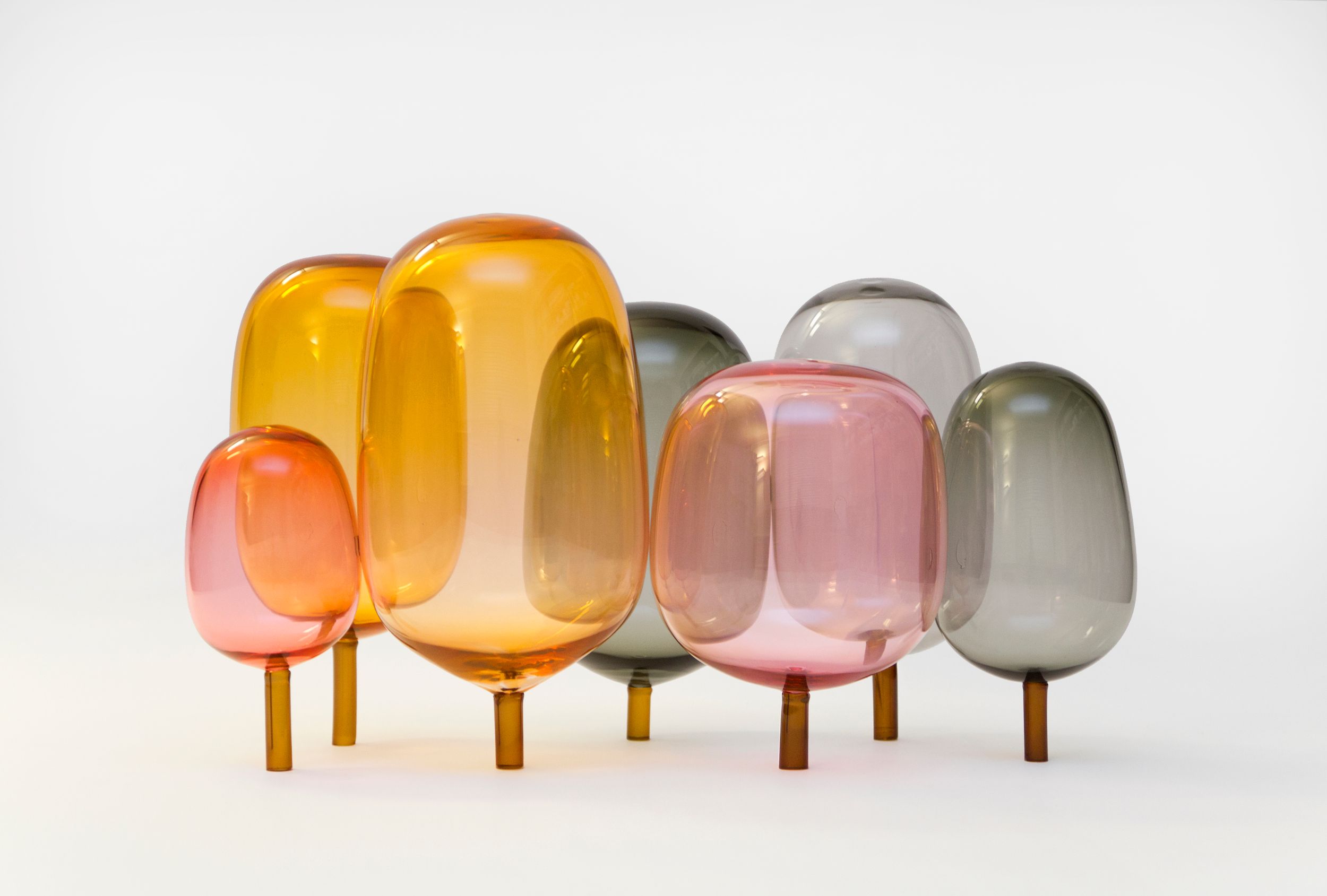 The woods designed by Jonas Stokke, Øystein Austad and Andreas Engesvik, pink and orange and grey glass sculptures, mouth blown glass