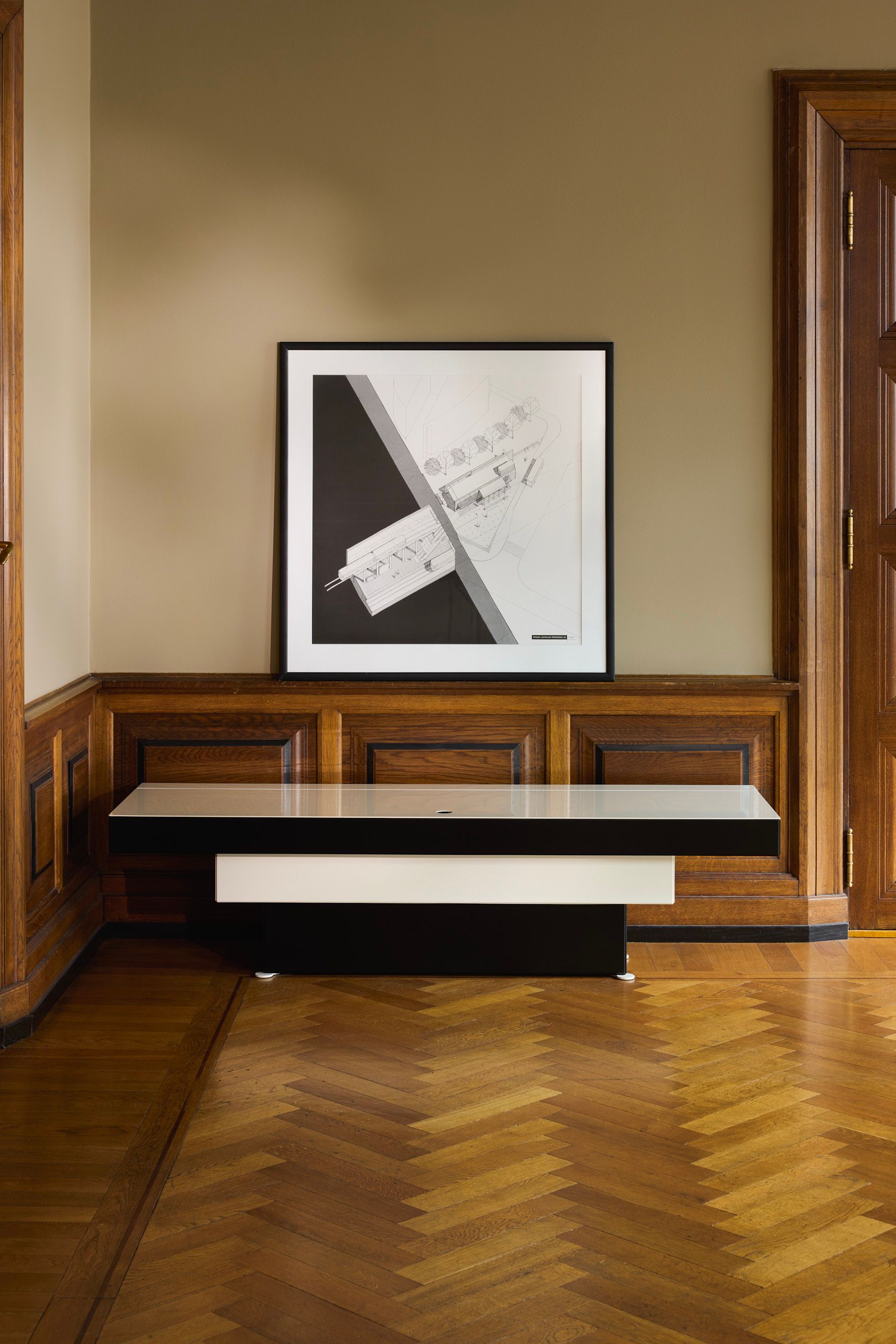 unit, a black and white steel cabinet that steps out like an inverted piramyde.