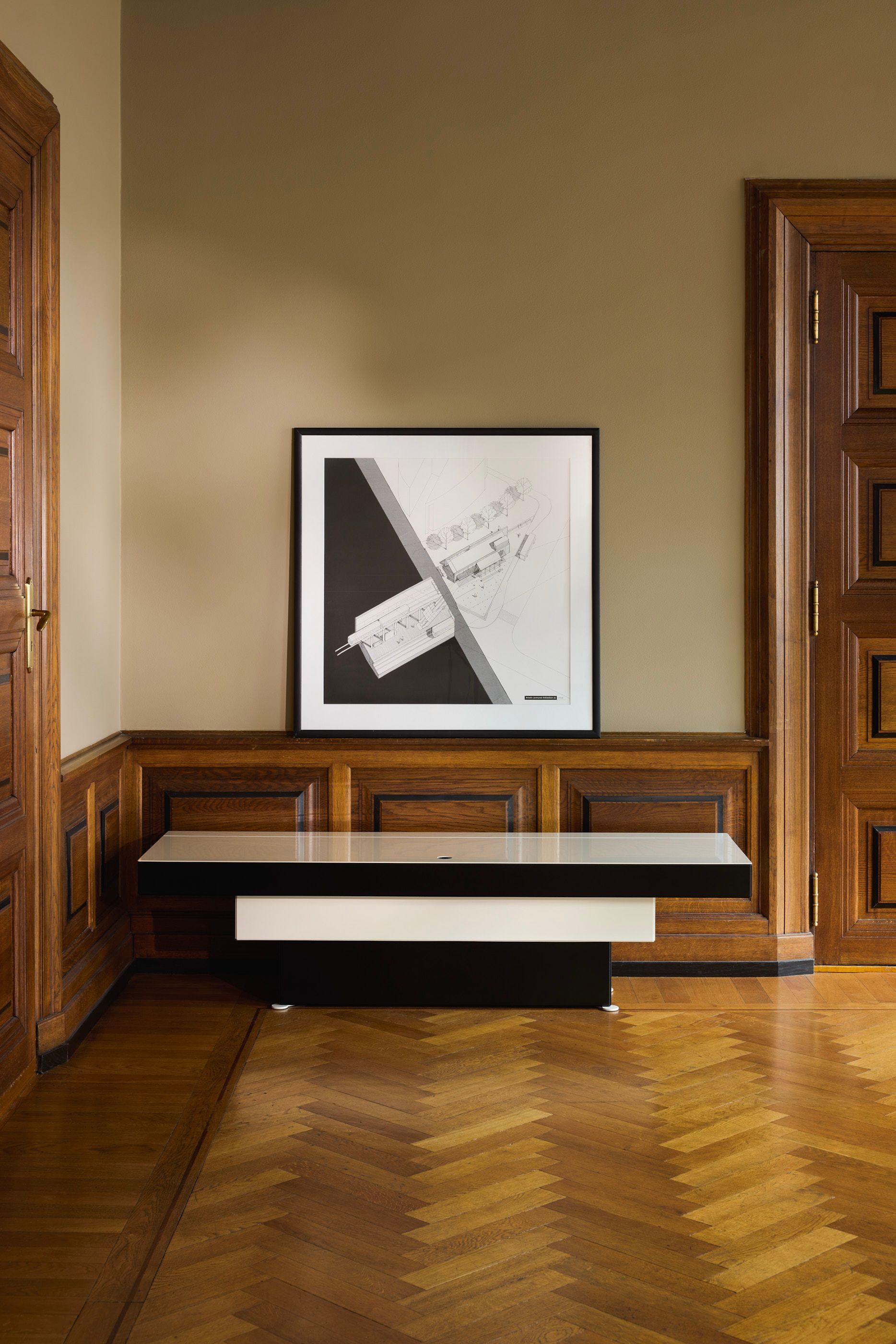unit, a black and white steel cabinet that steps out like an inverted piramyde.