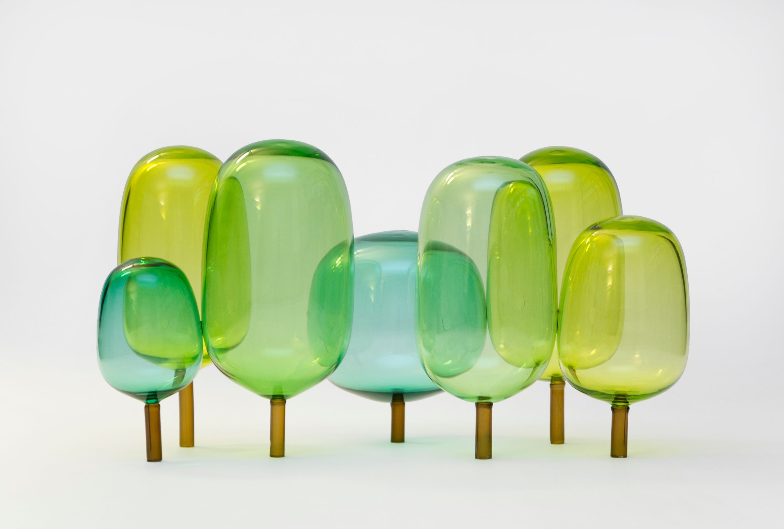 The woods designed by Jonas Stokke, Øystein Austad and Andreas Engesvik, blue and green glass sculptures, mouth blown