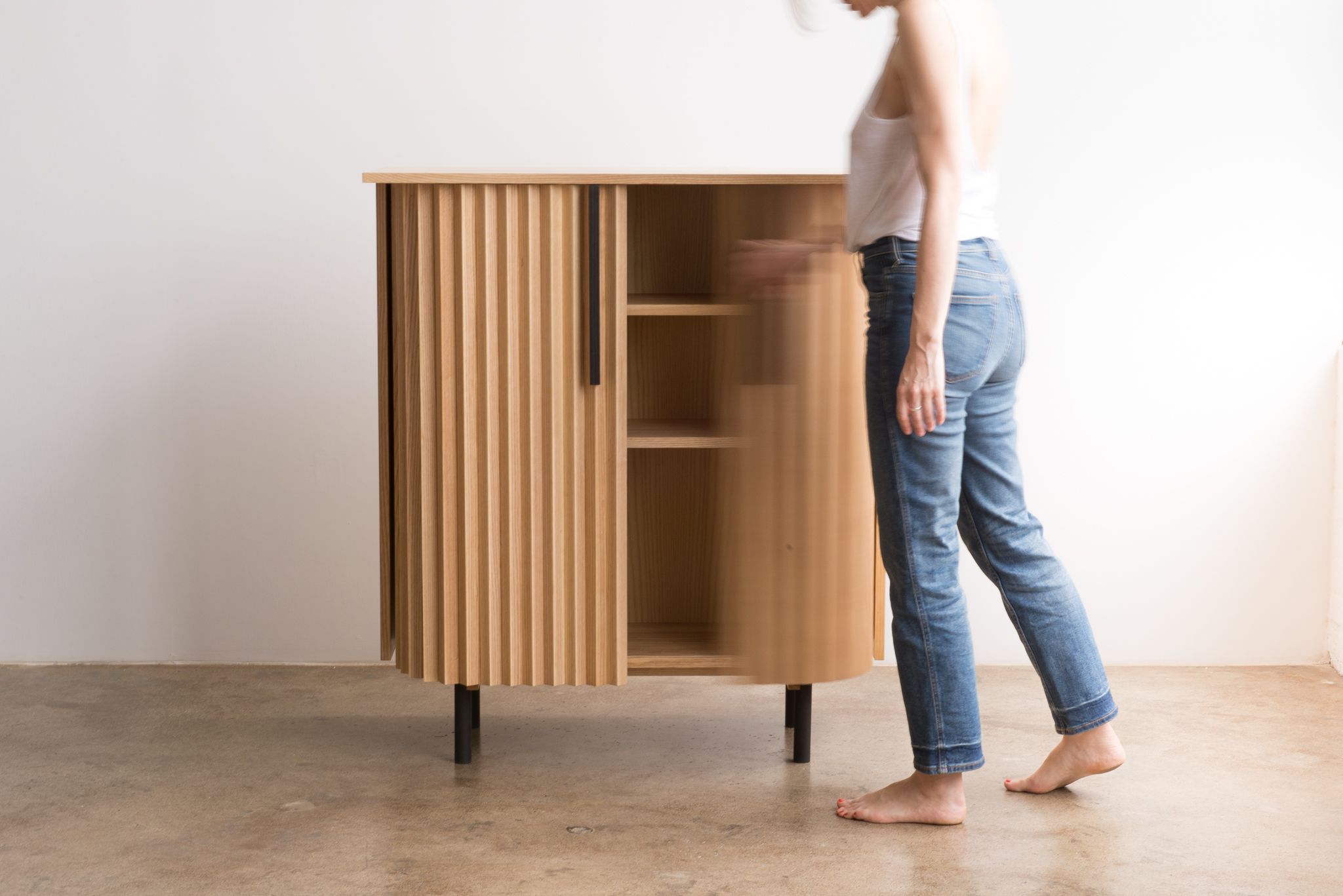 Tambour Cabinet designed by Jonas Stokke, wooden cabinet with sliding doors, GIF