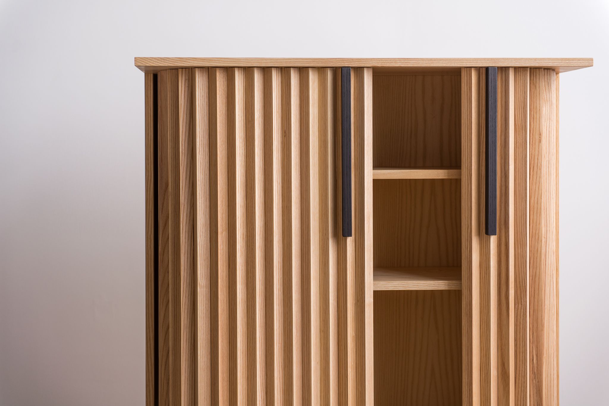 Tambour Cabinet designed by Jonas Stokke, wooden cabinet with sliding doors, open doors