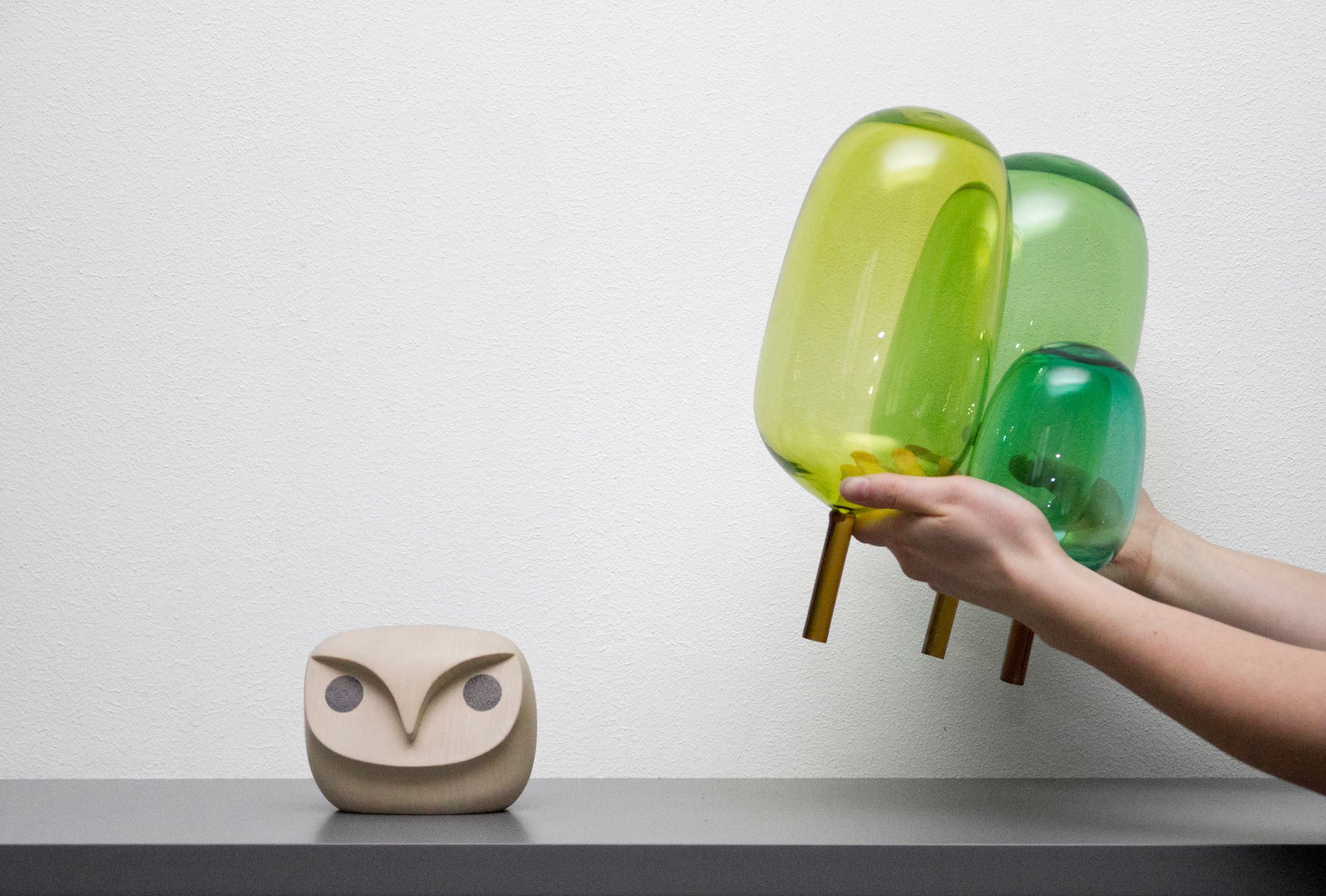 The woods designed by Jonas Stokke, Øystein Austad and Andreas Engesvik, green glass sculptures, mouth blown glass