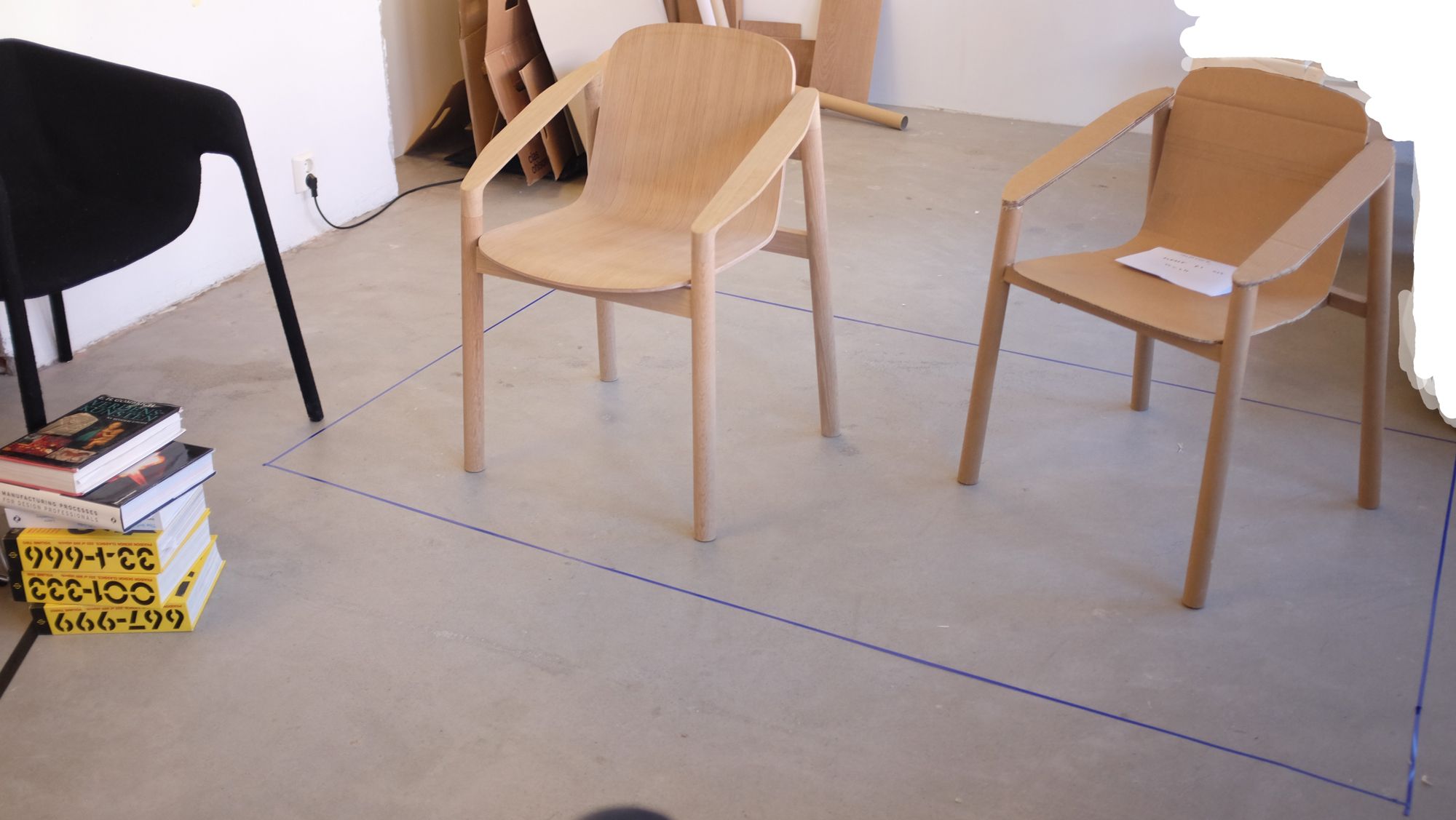 card model and wooden prototype of a dining chair