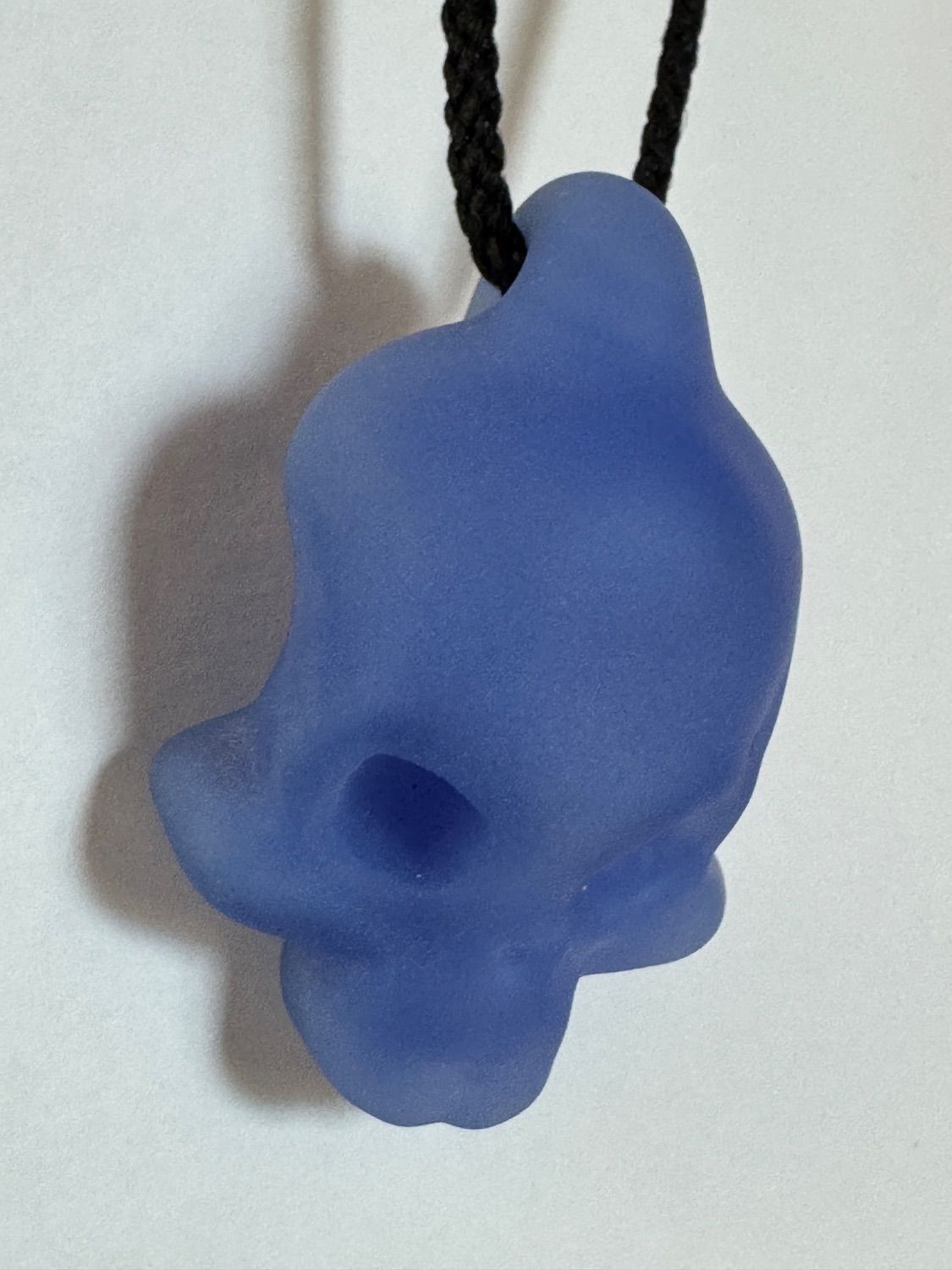 Hand Blown Frosted Blue Glass Skull Pendant Necklace on Black Cord - beerglass
