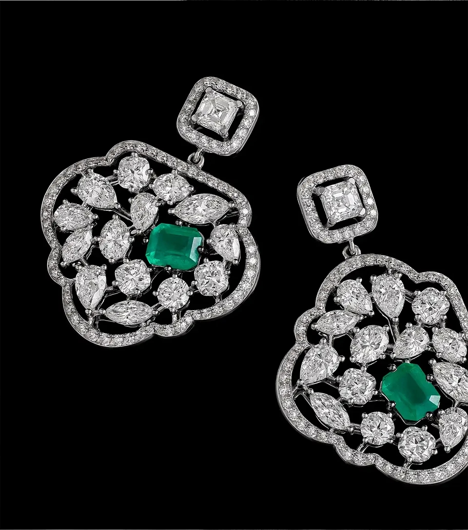 Unique 18K White- Gold Earrings with a variety of Diamonds and Zambian Emeralds