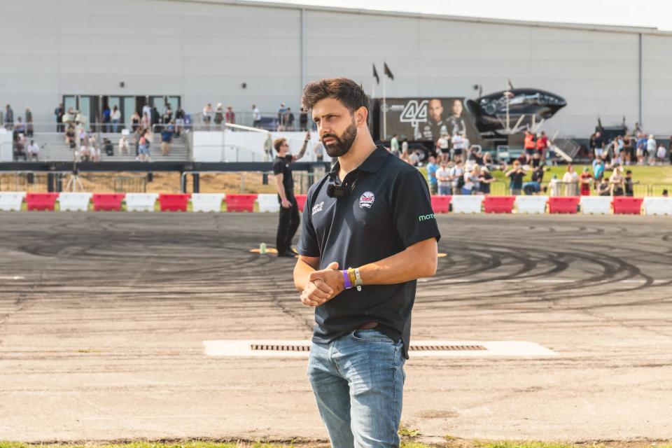 Sam standing on the track at a motor show action day