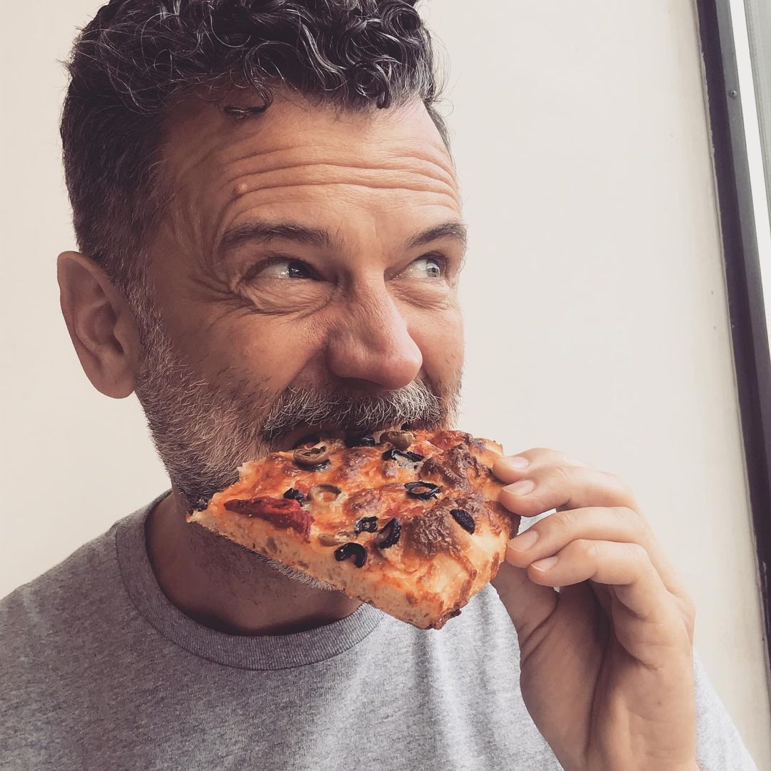 Paul Dotey with pizza