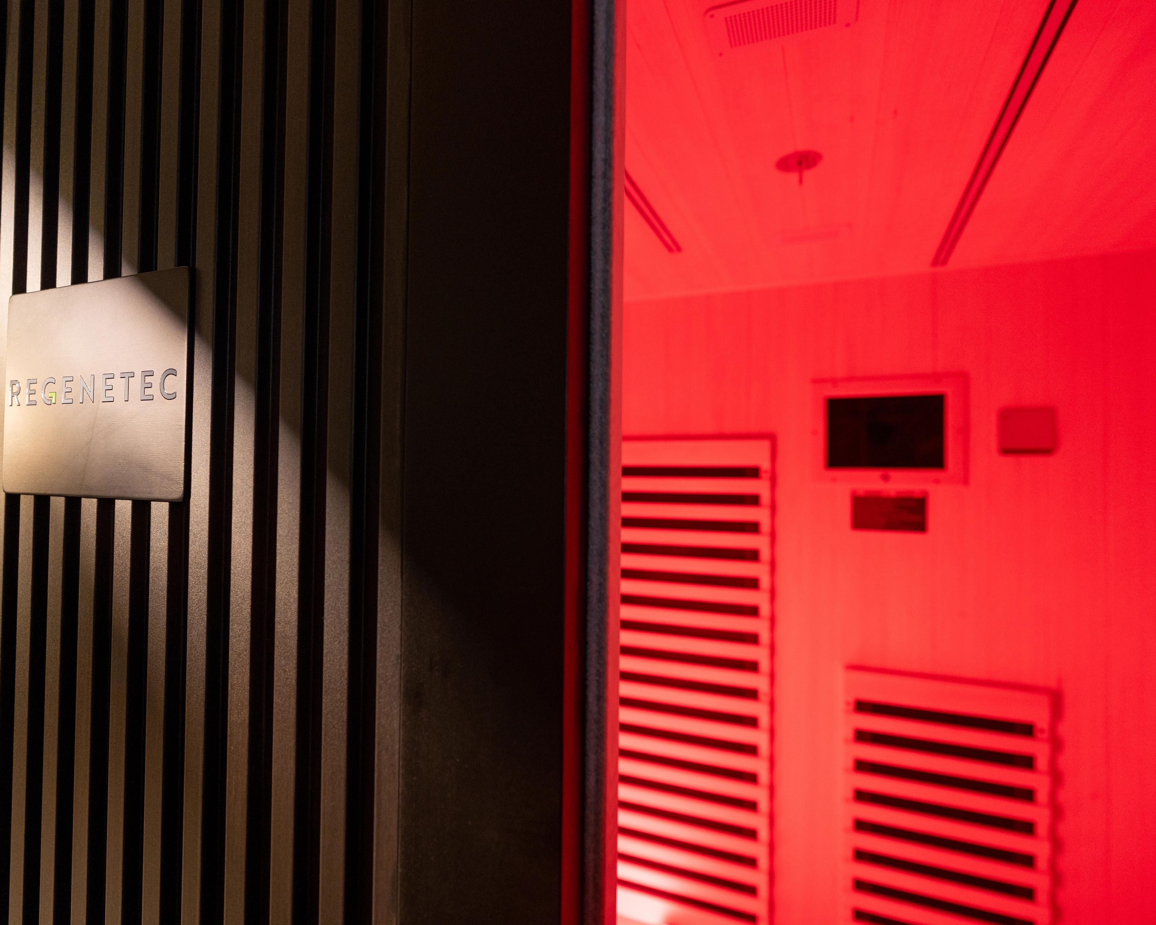 Close up of Infrared Sauna opening with glowing red light