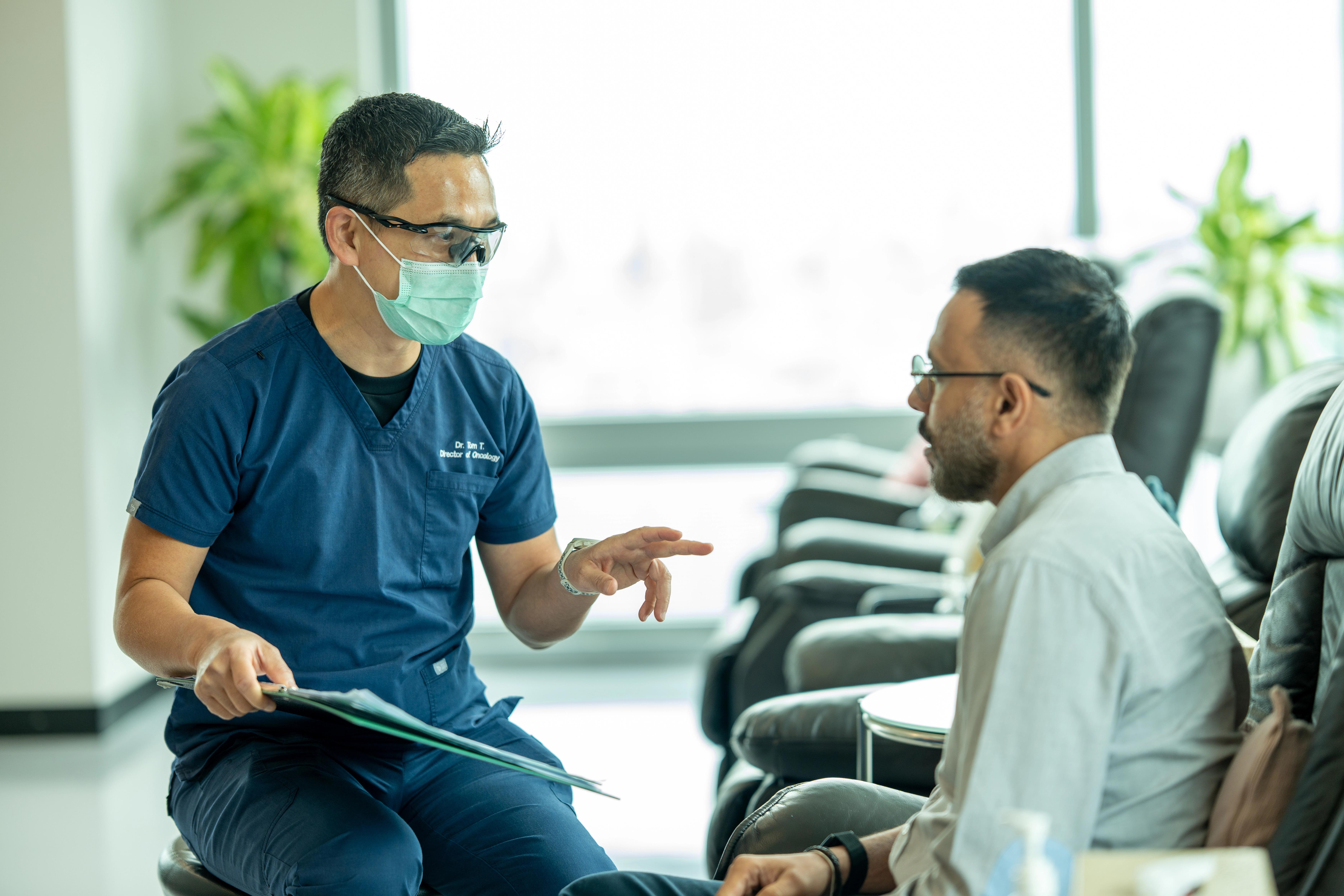 A Verita Life doctor discussing care with a patient