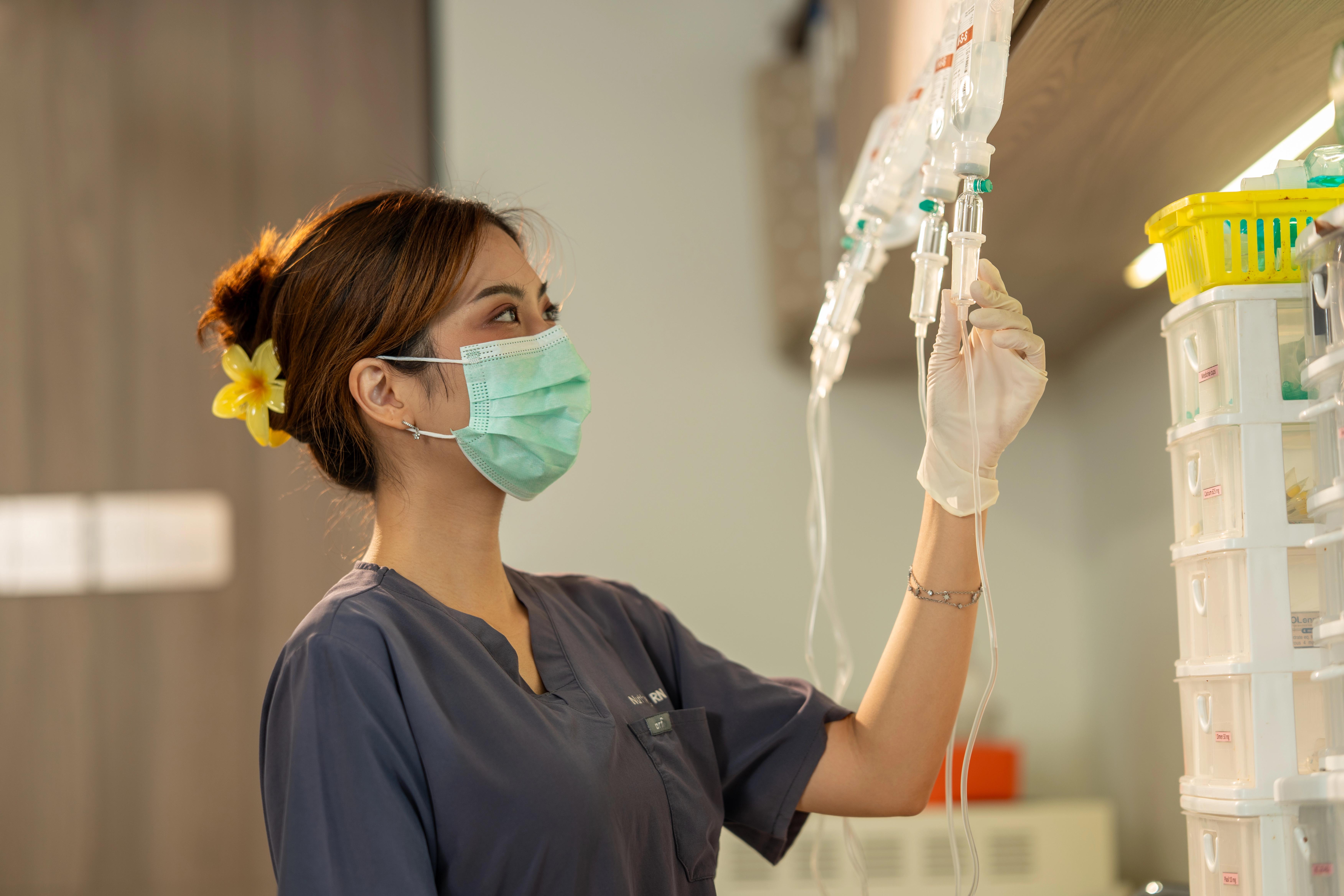 A nurse caring for a patient in a Verita Life treatment room