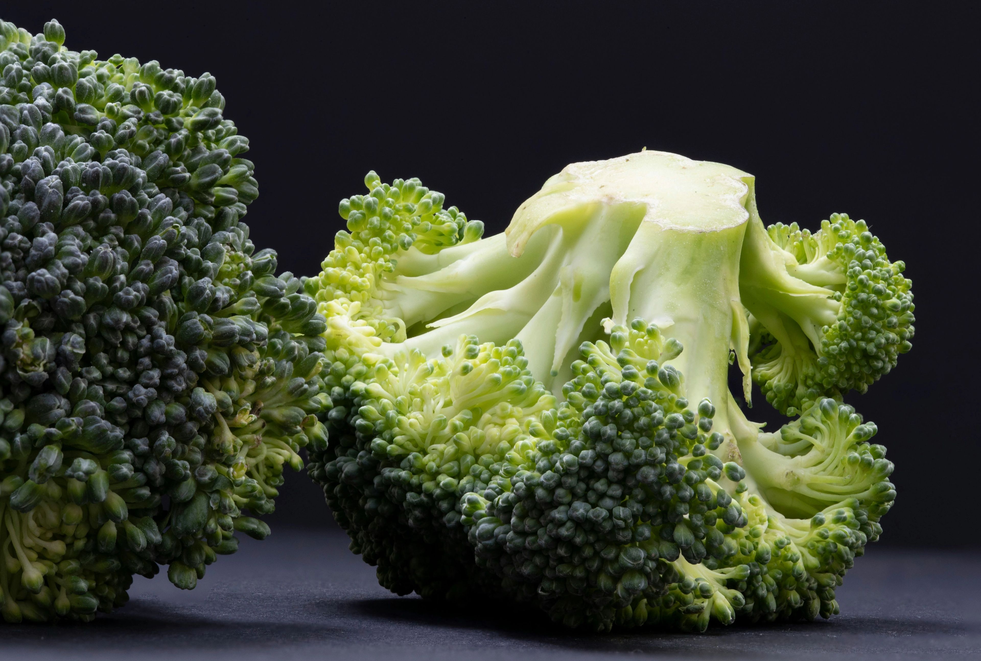 Fresh green broccoli florets, representing healthy foods and nutrition that may support overall health and cancer risk reduction.