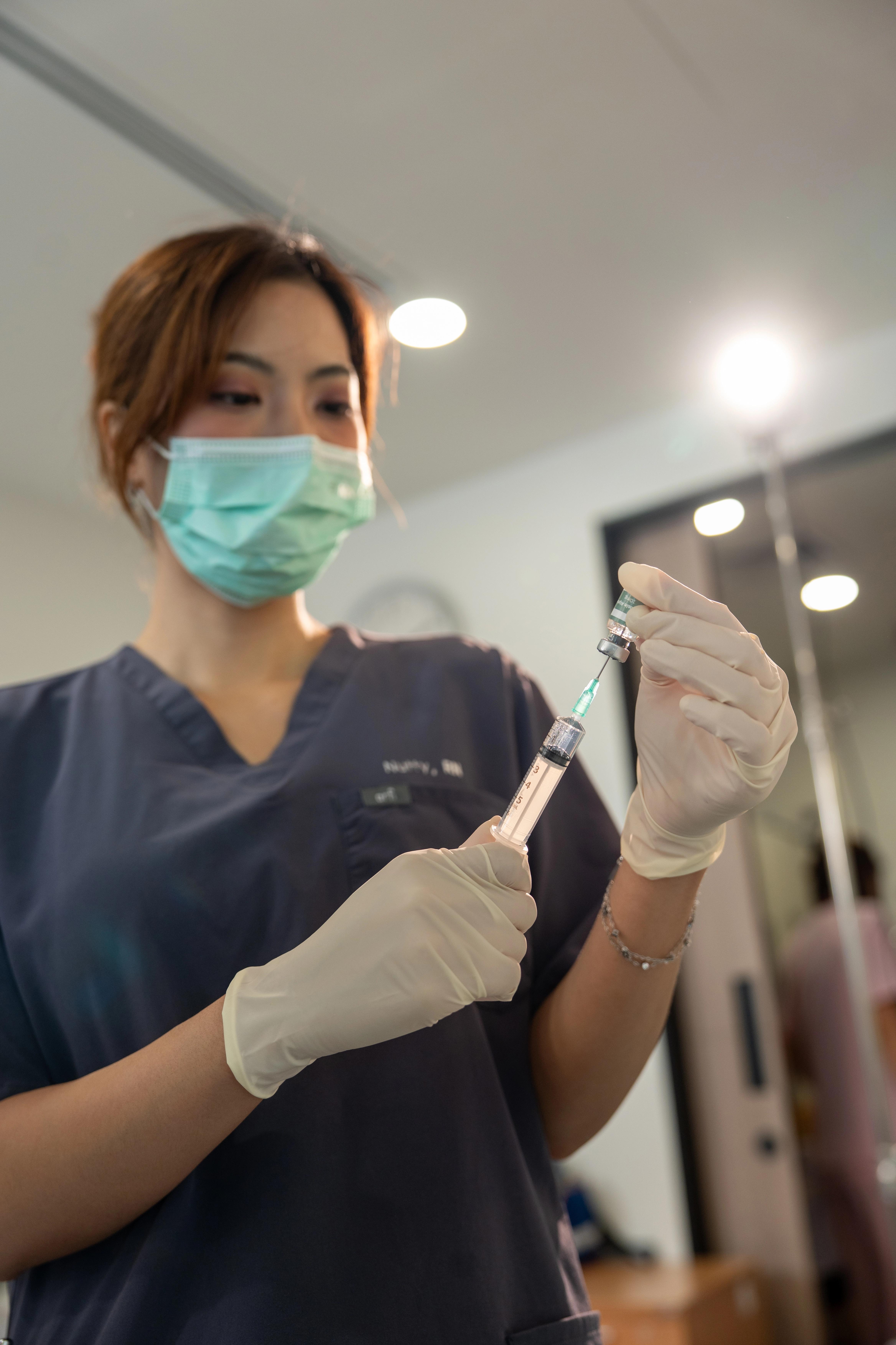 A nurse caring for a patient in a Verita Life treatment room