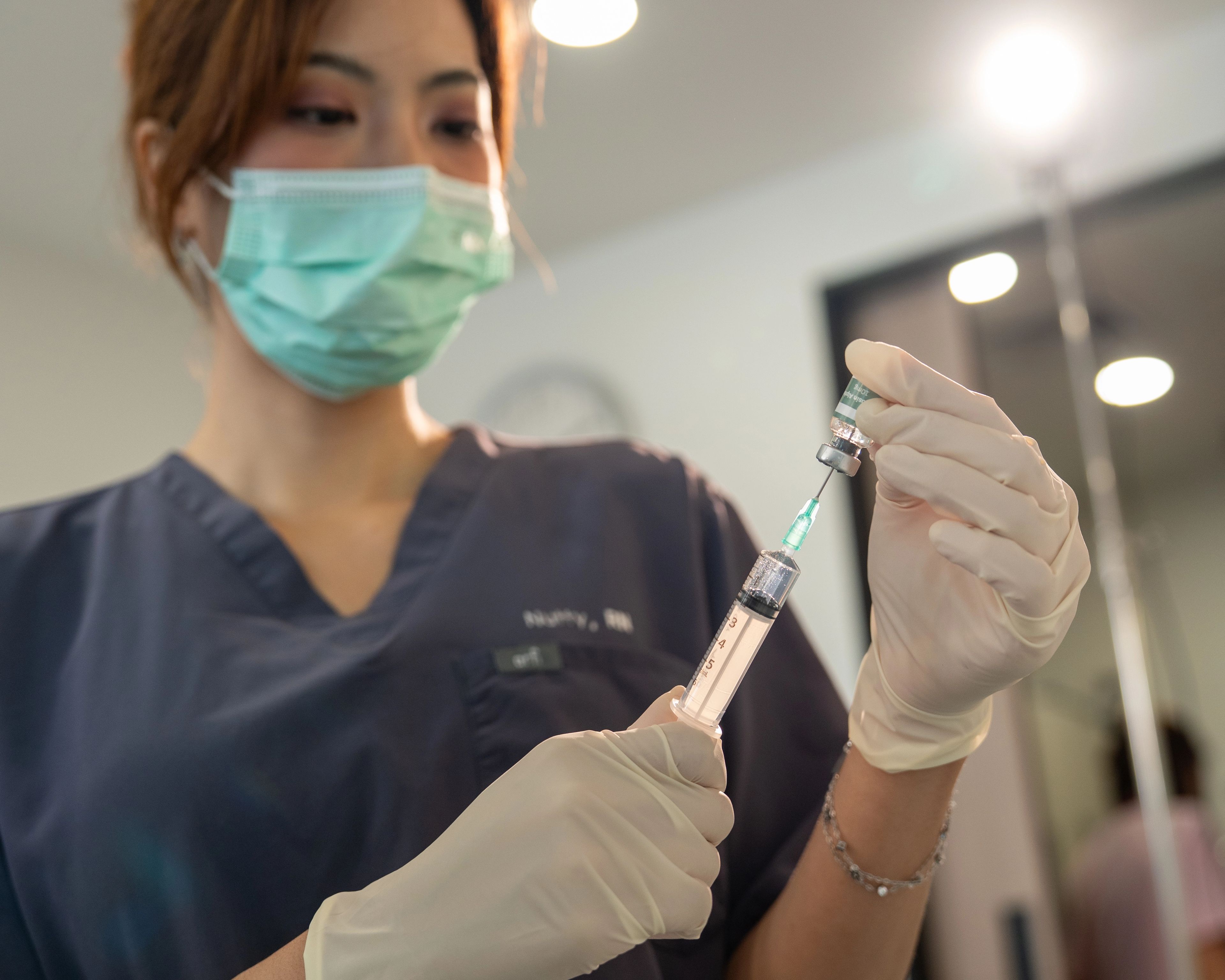 A nurse caring for a patient in a Verita Life treatment room