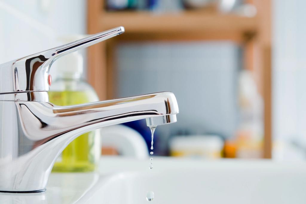 Close up photo of a dripping tap