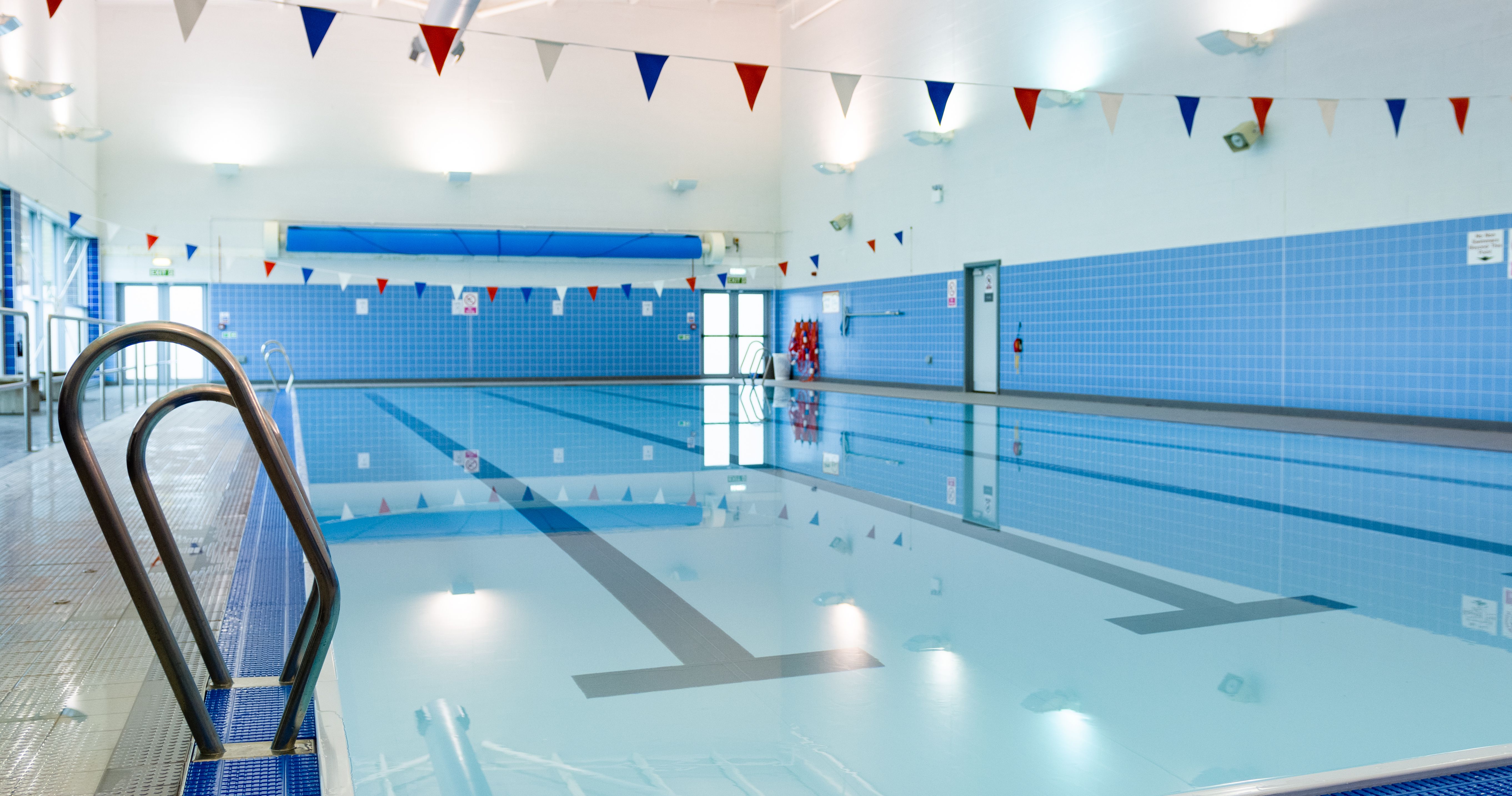A swimming pool inside a gym
