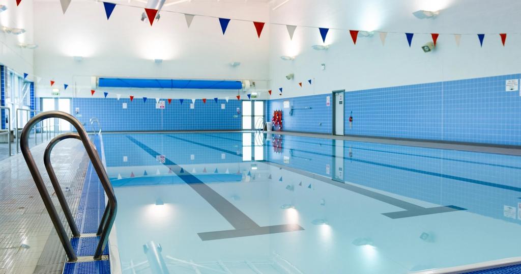 A swimming pool inside a gym