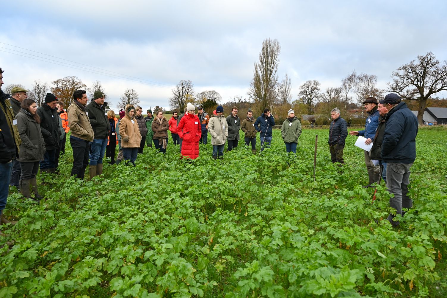 People gathering for a talk from a local farmer who is working closely with South East Water