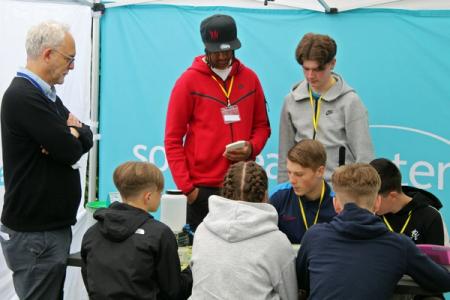 students participate in an activity run by South East Water