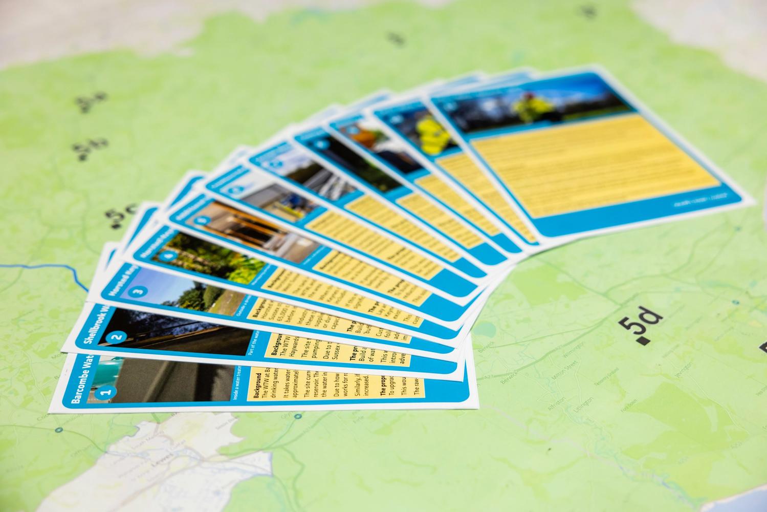 Photo of a stack of South East Water leaflets laid out on a table