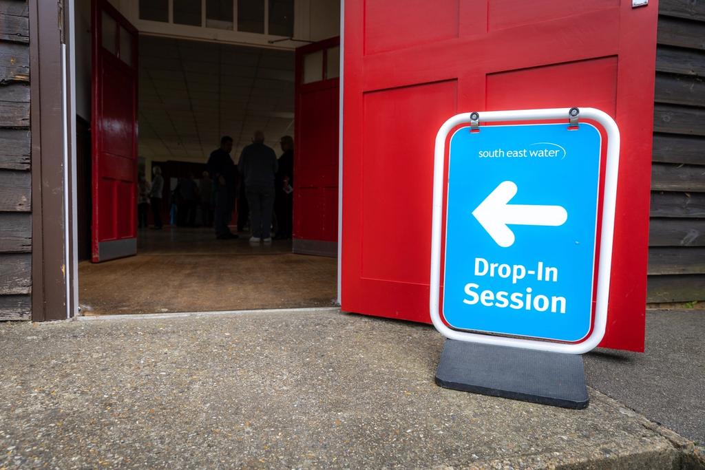 Image showing a drop in session sign by an open door