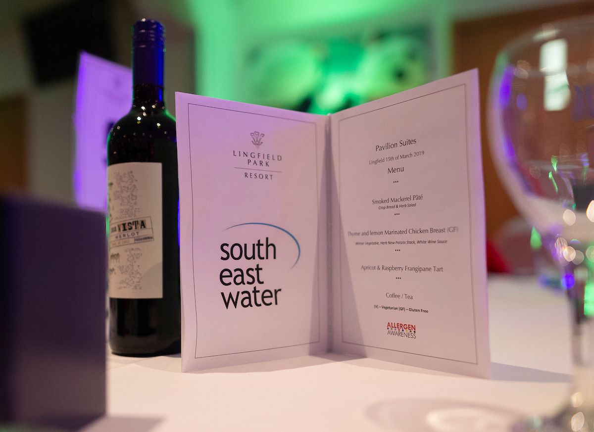 Wine bottle and South East Water menu 