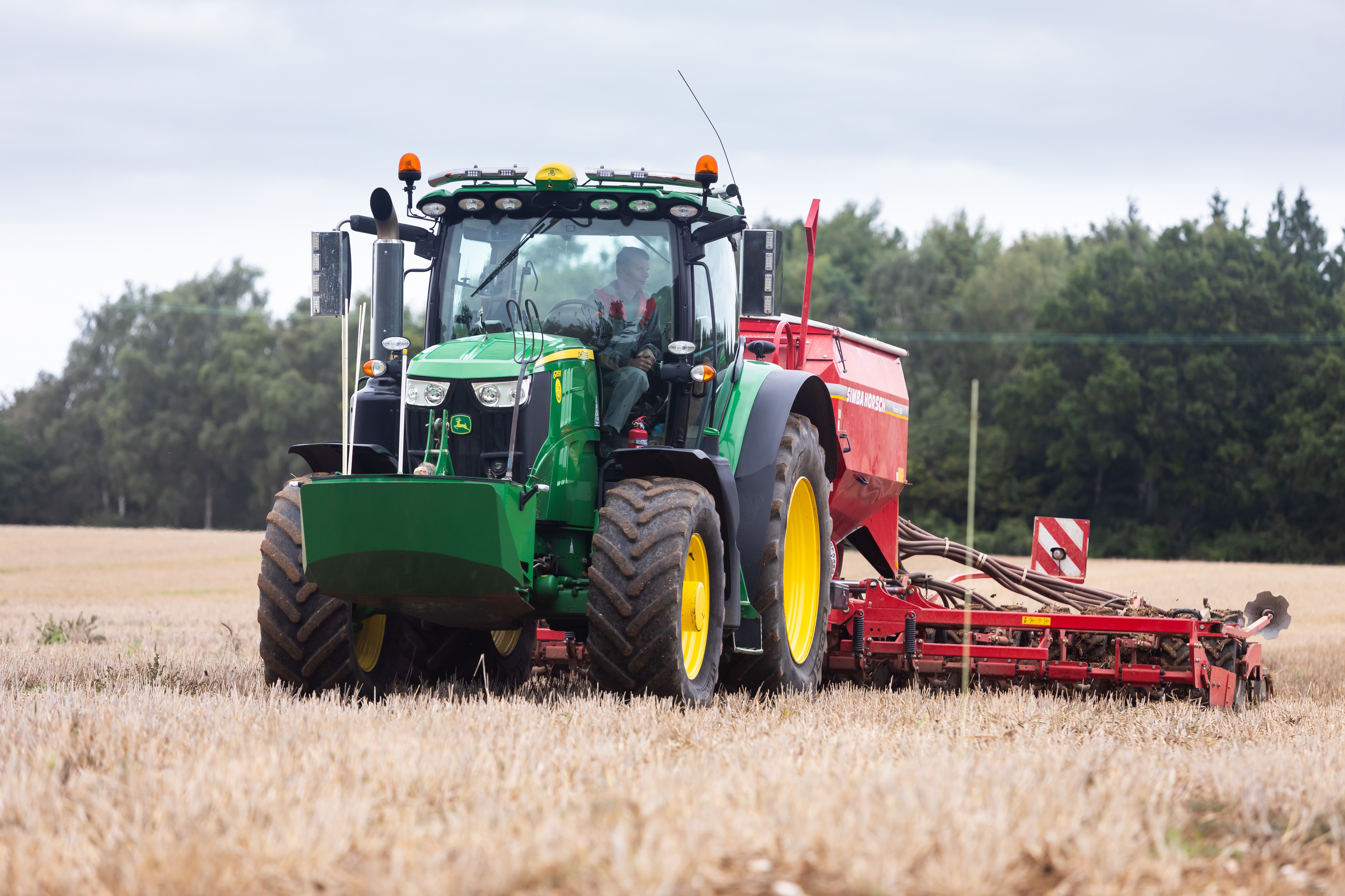 Tractor harvesting wheat 