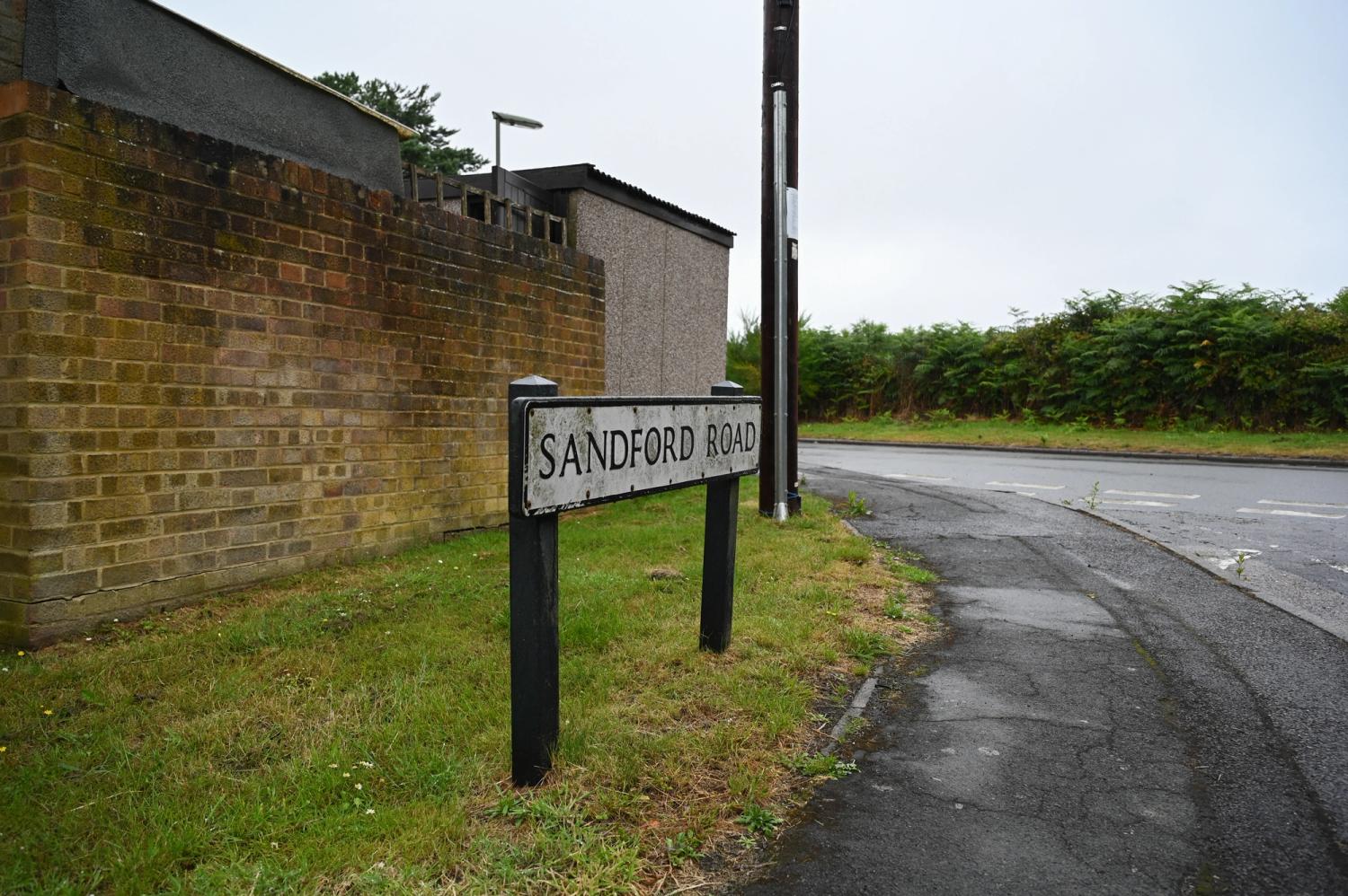 Road sign showing Sandford Road