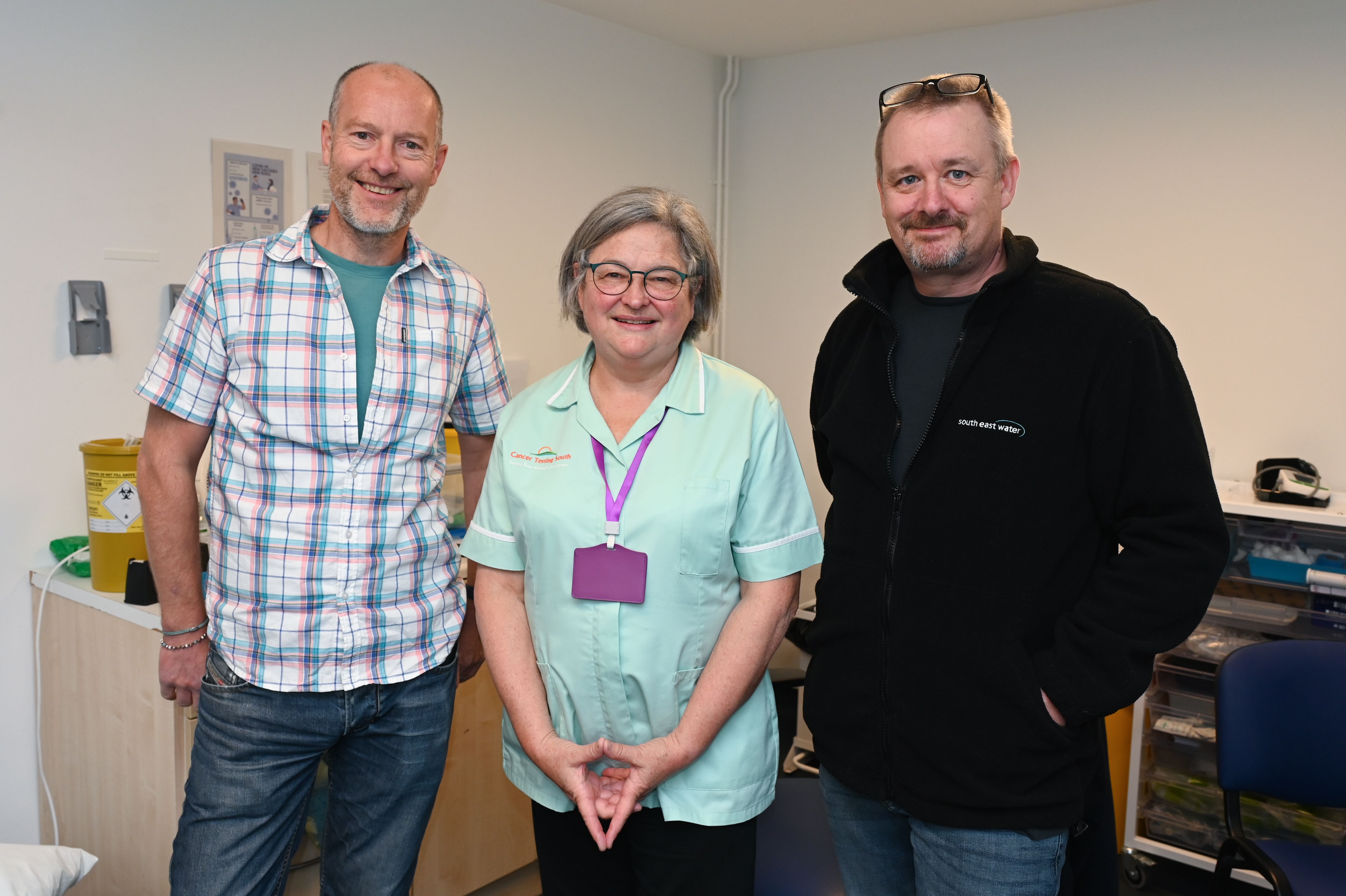 Photo of two South East Water employees attending the screening day in Farnborough.