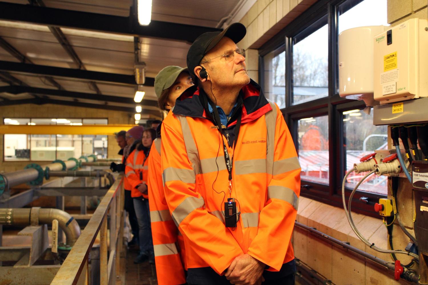 Visitor wearing a hi-vis jacket at a Water Treatment Works