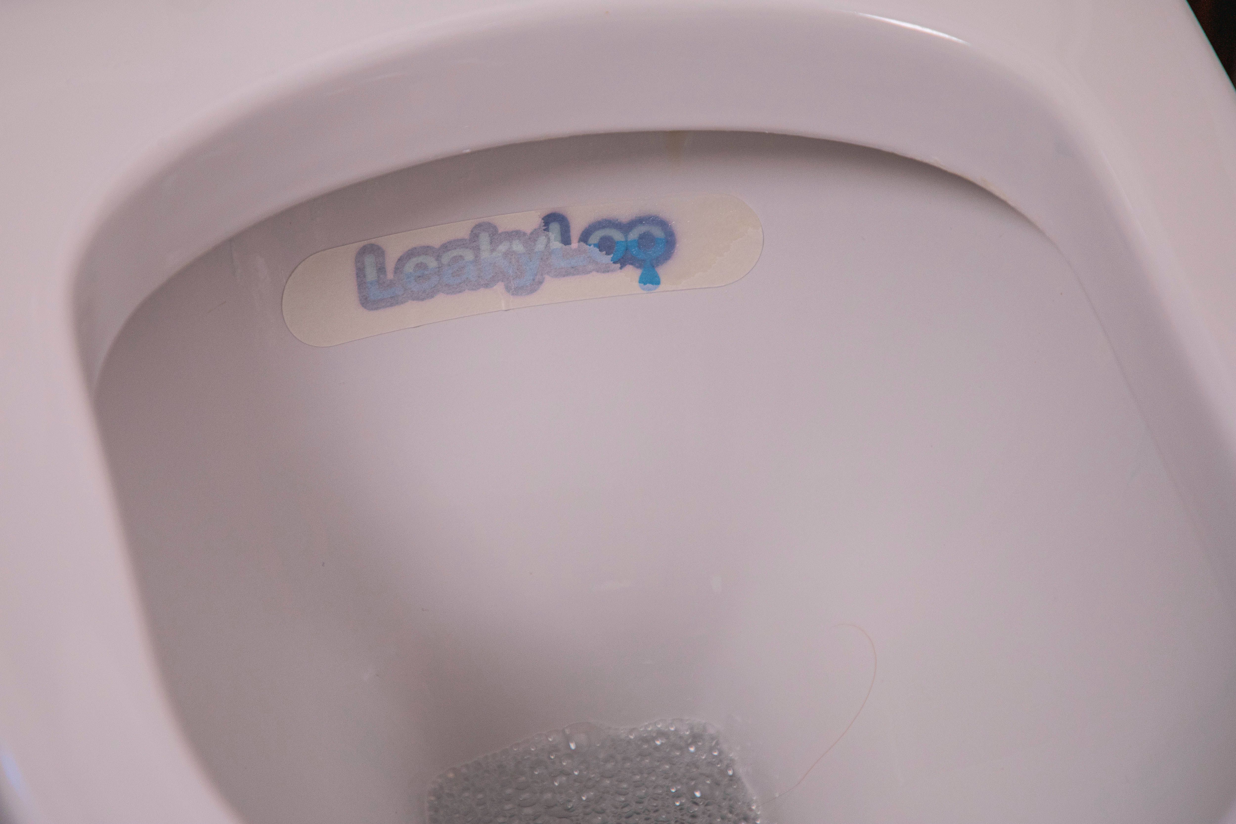 LeakyLoo strip in toilet pan