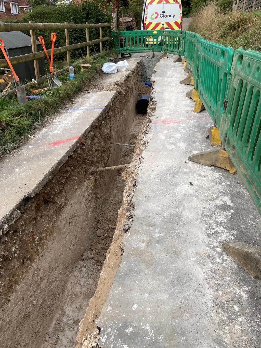 Image showing trench cut into Pilgrims Way for main to be installed