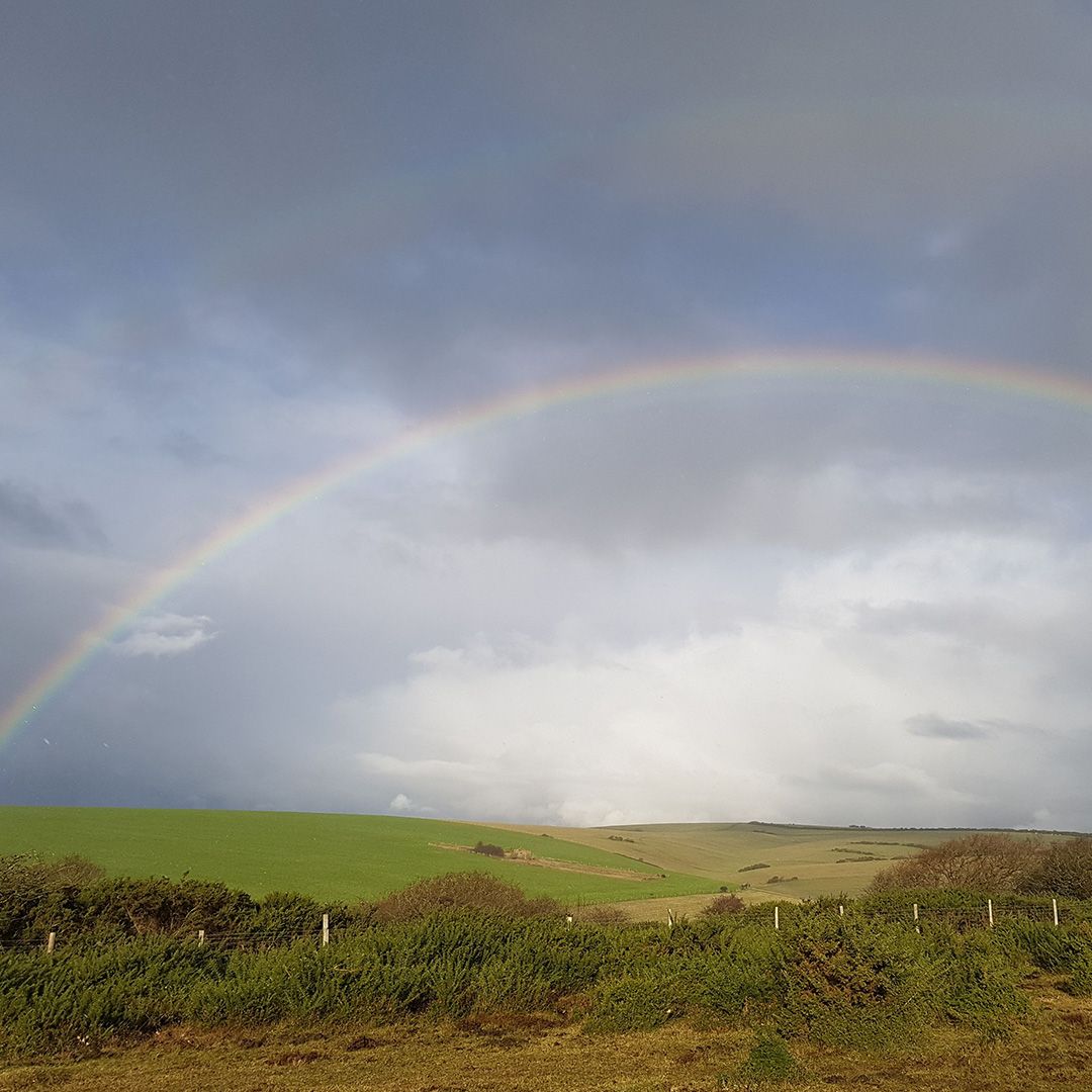 A rainbow over fields