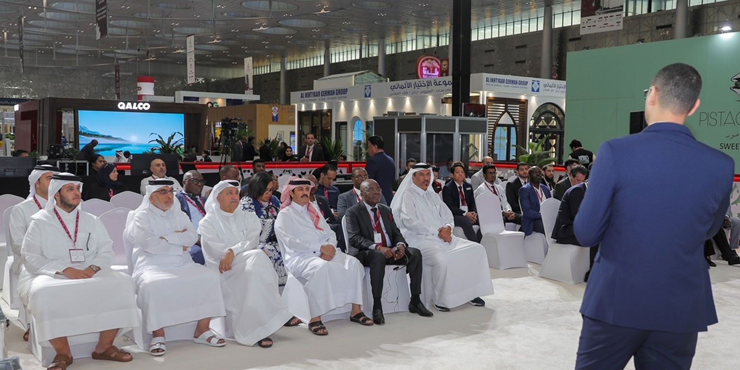 International business meeting at a Qatar exhibition connecting global brands with regional decision-makers