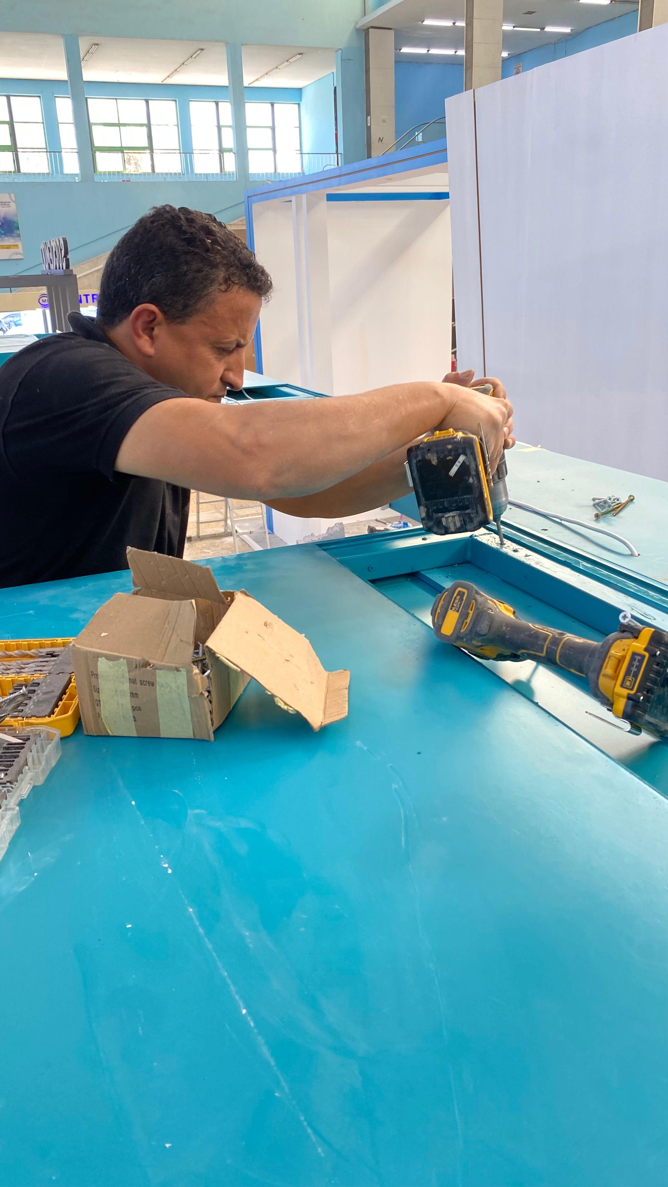 Exhibition stand installation team delivering a project from design to execution.